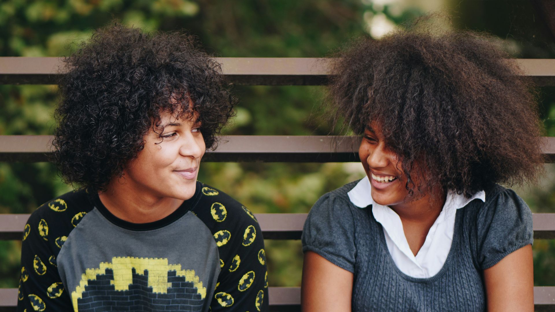 two persons staring at each other