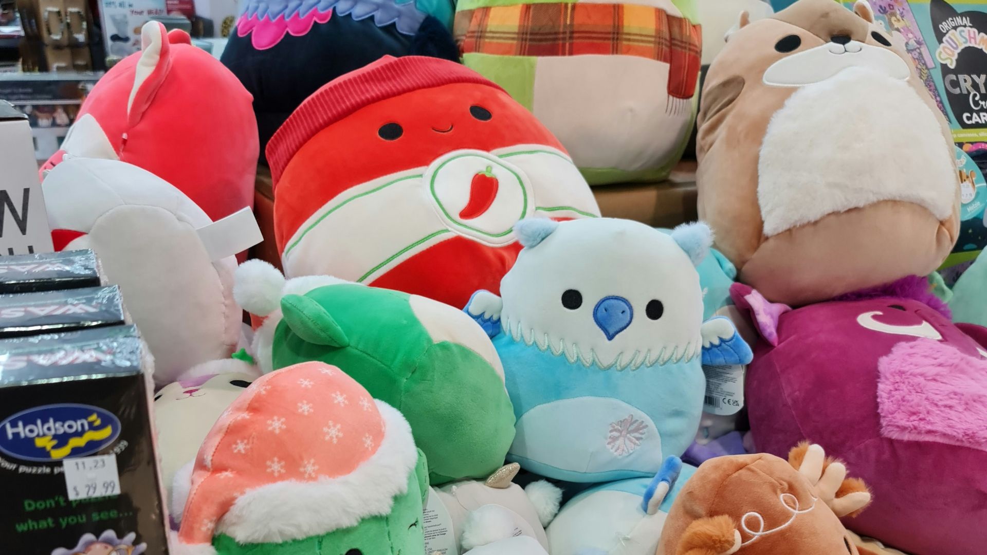 a pile of stuffed animals sitting on top of a table