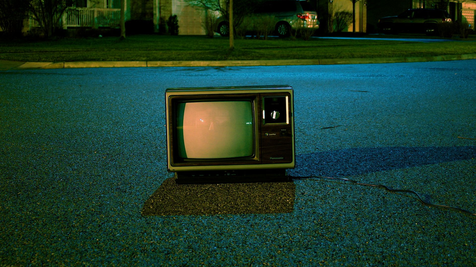 turned off vintage CRT television on road