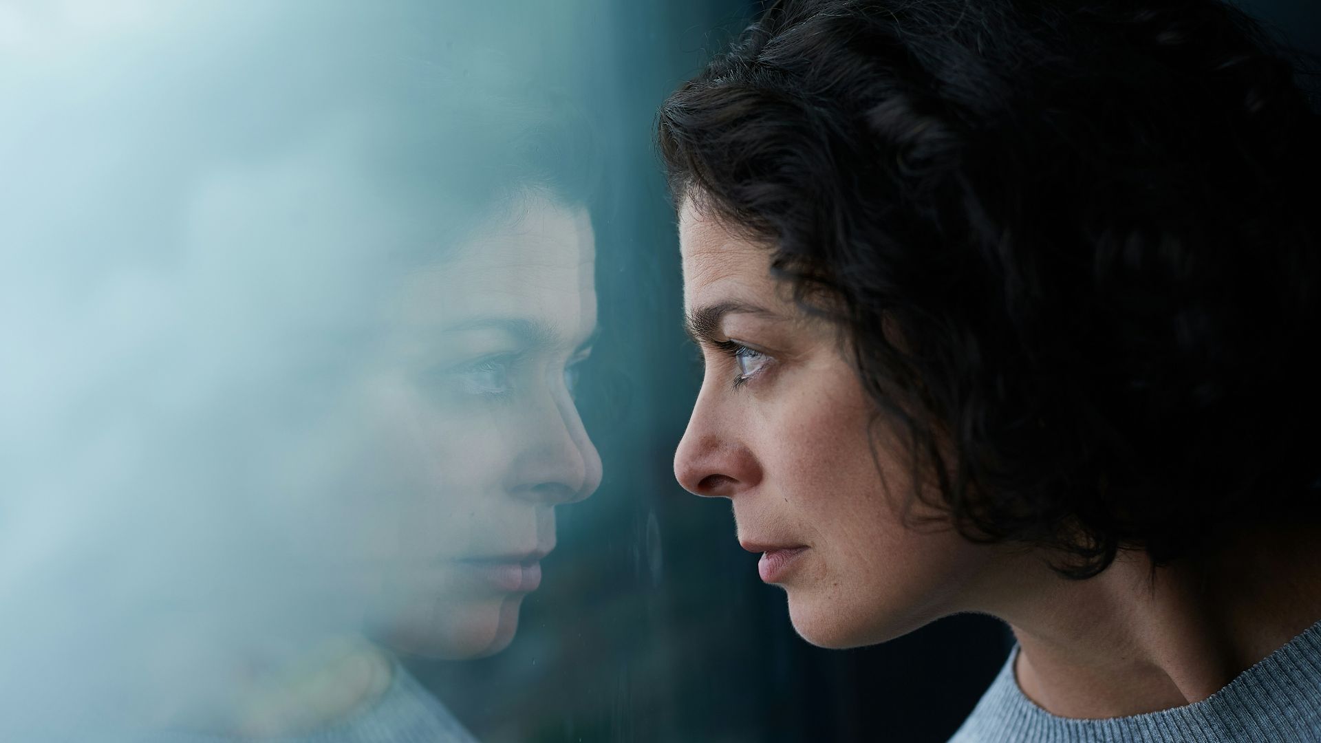 woman in gray crew neck shirt