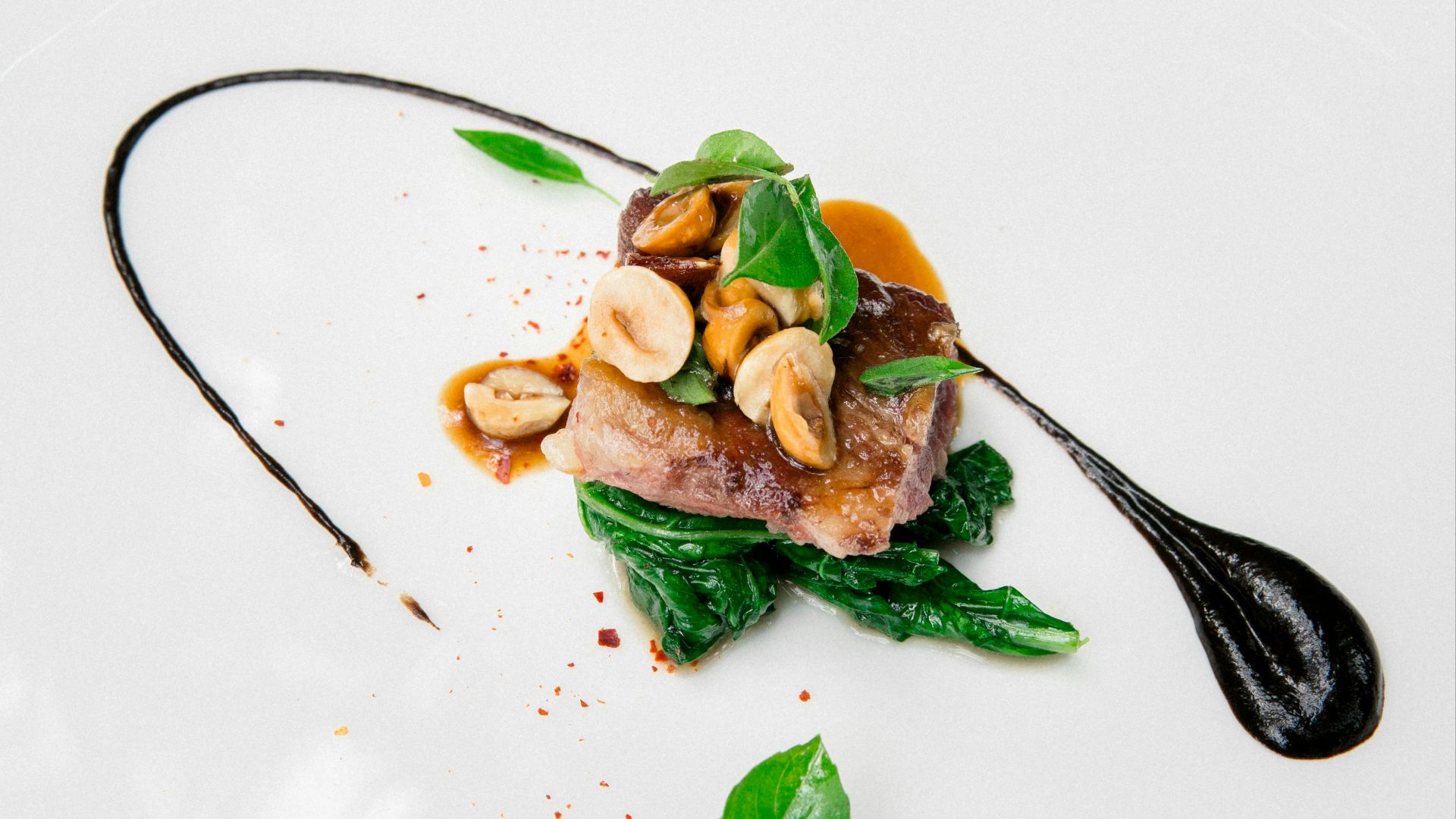 stainless steel fork on white ceramic plate