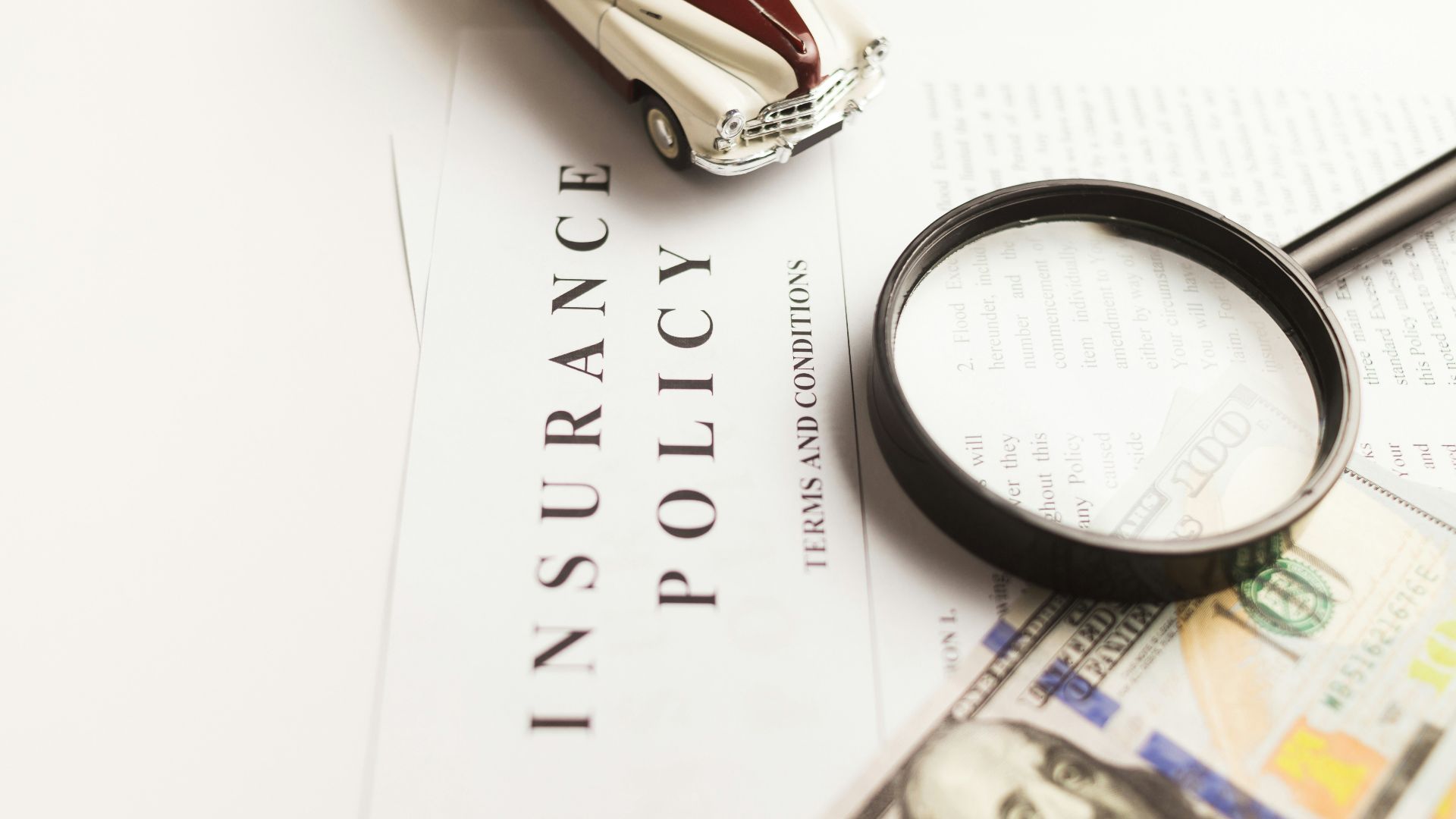 a magnifying glass sitting on top of a piece of paper