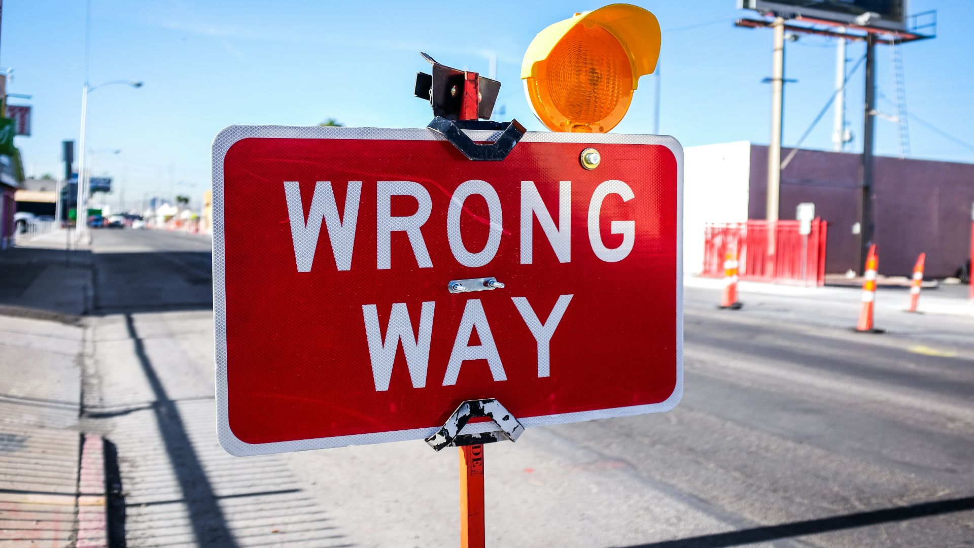 red Wrong Way signage on road