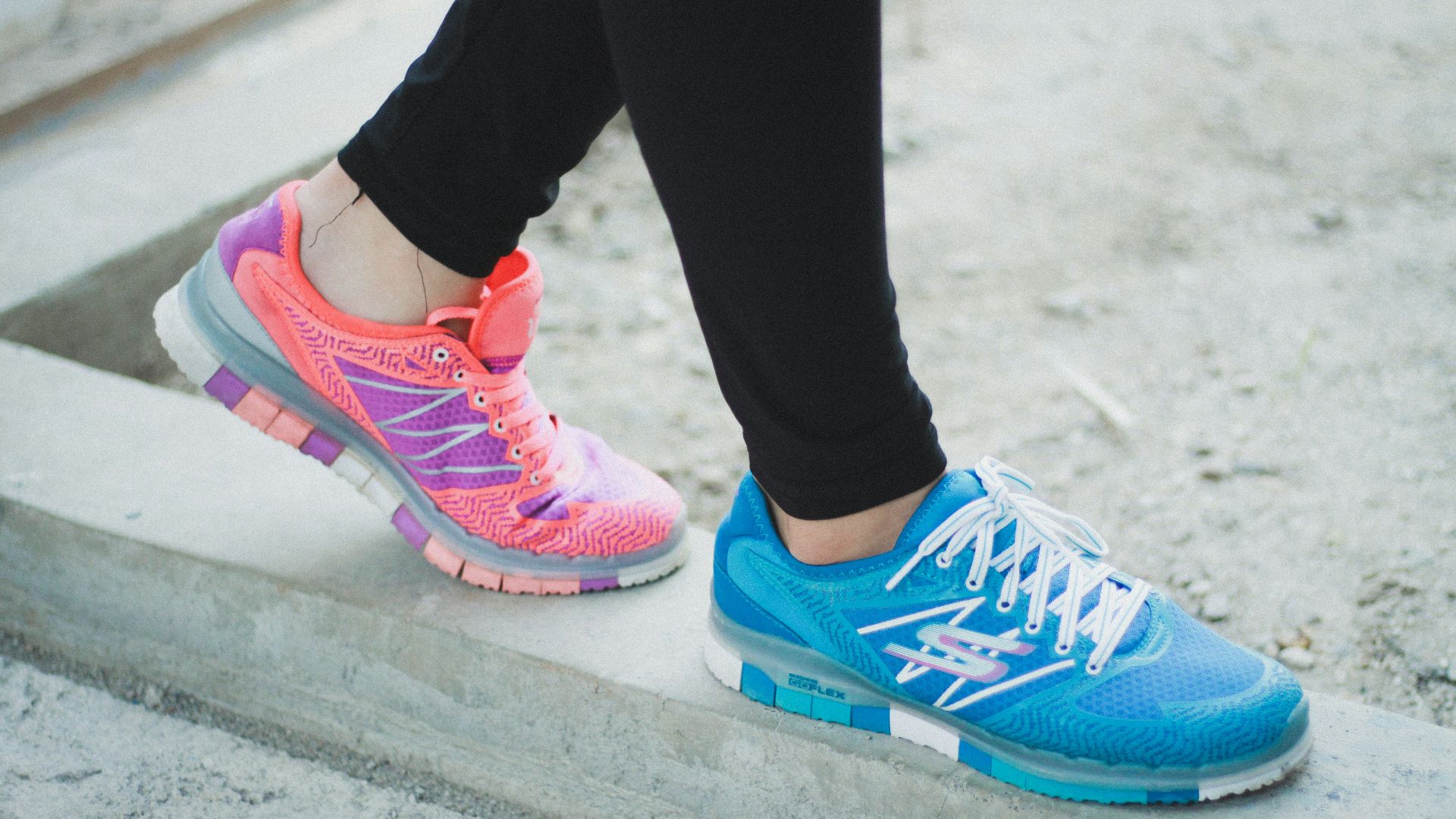 person wearing running shoes