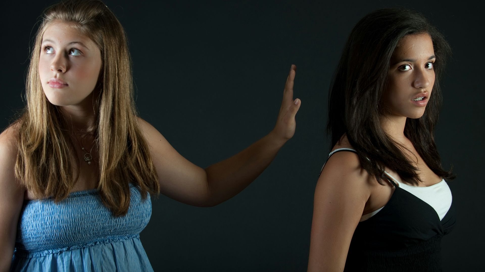 girl in blue sleeveless dress