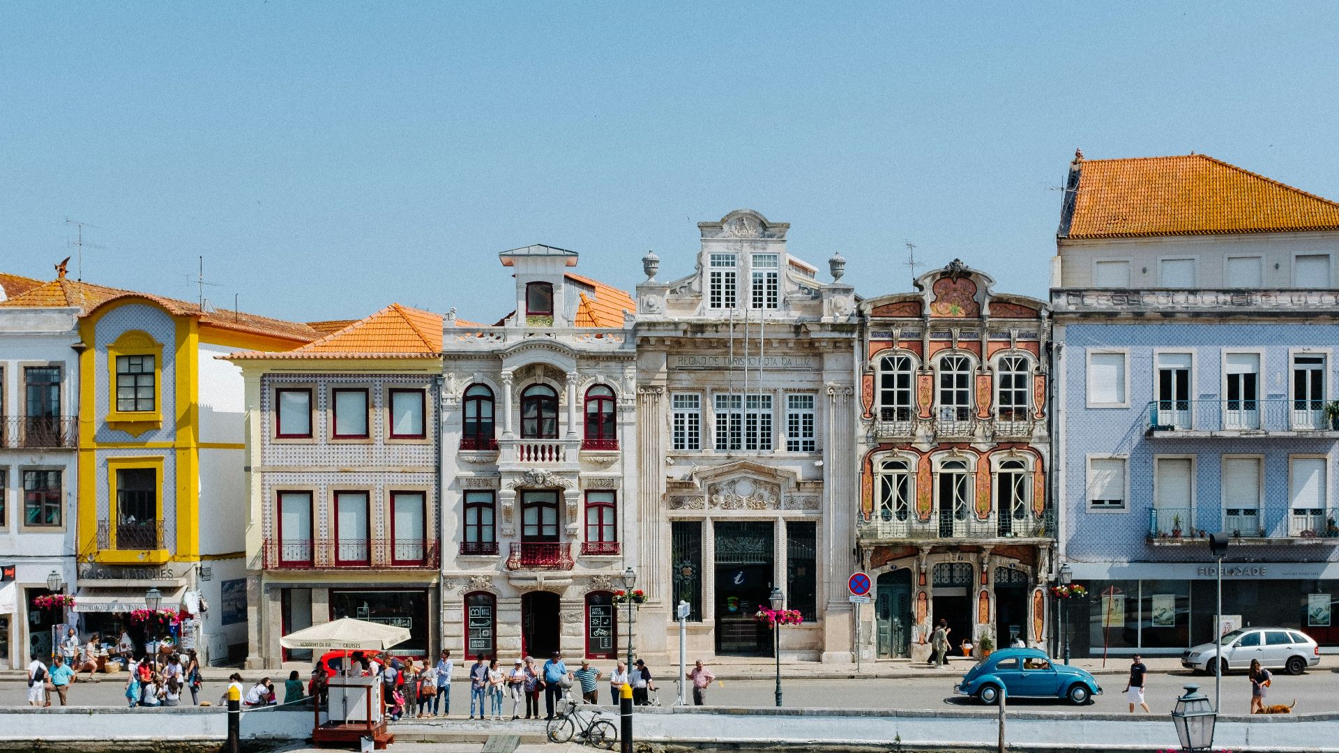 group of people beside water