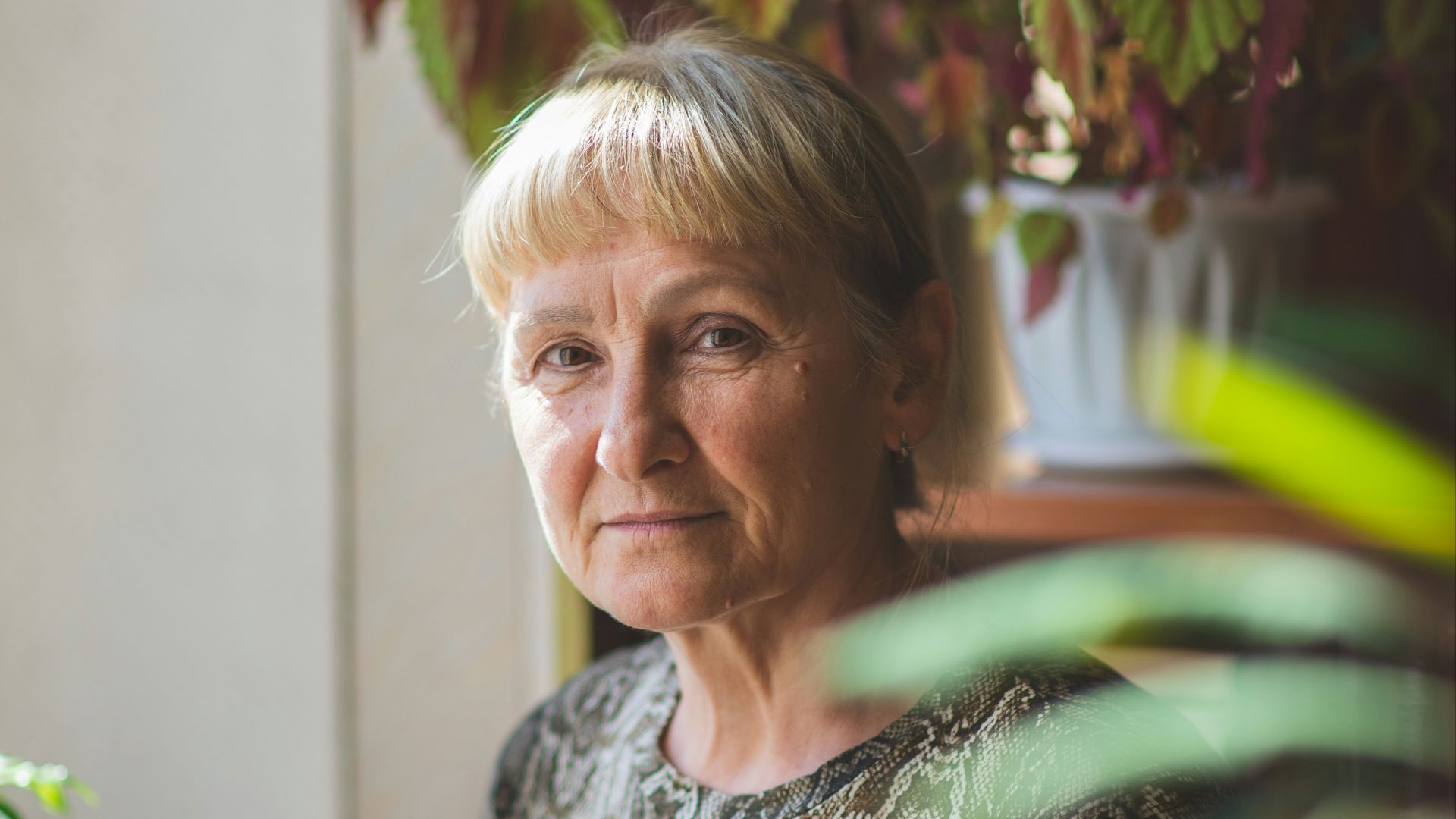 woman in gray and white crew neck shirt