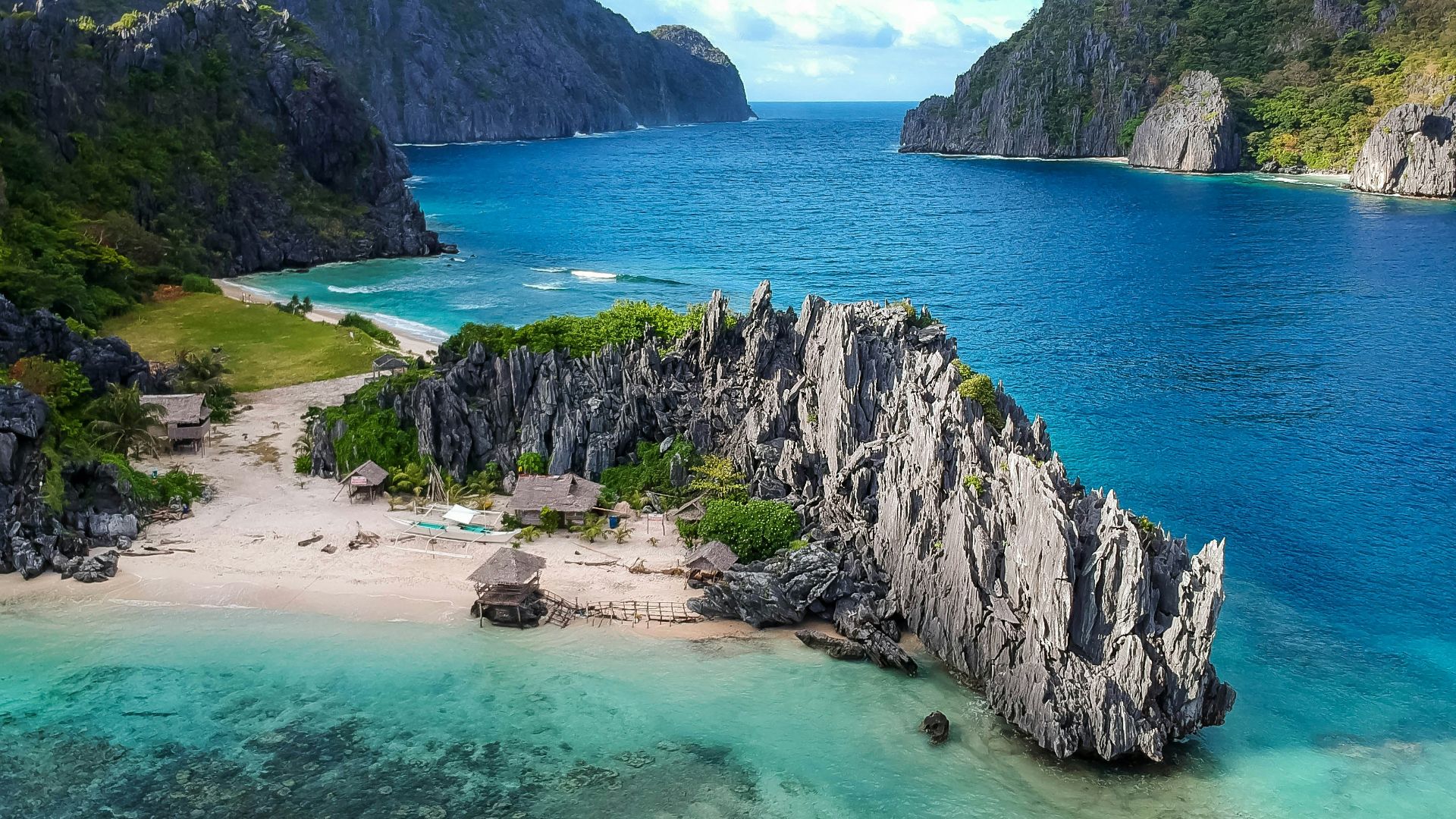 aerial photo of body of water between mountains