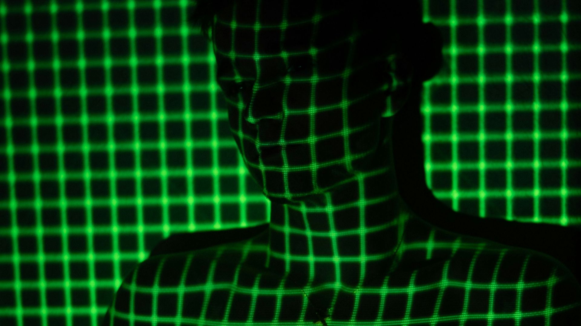 woman in white and black checkered long sleeve shirt