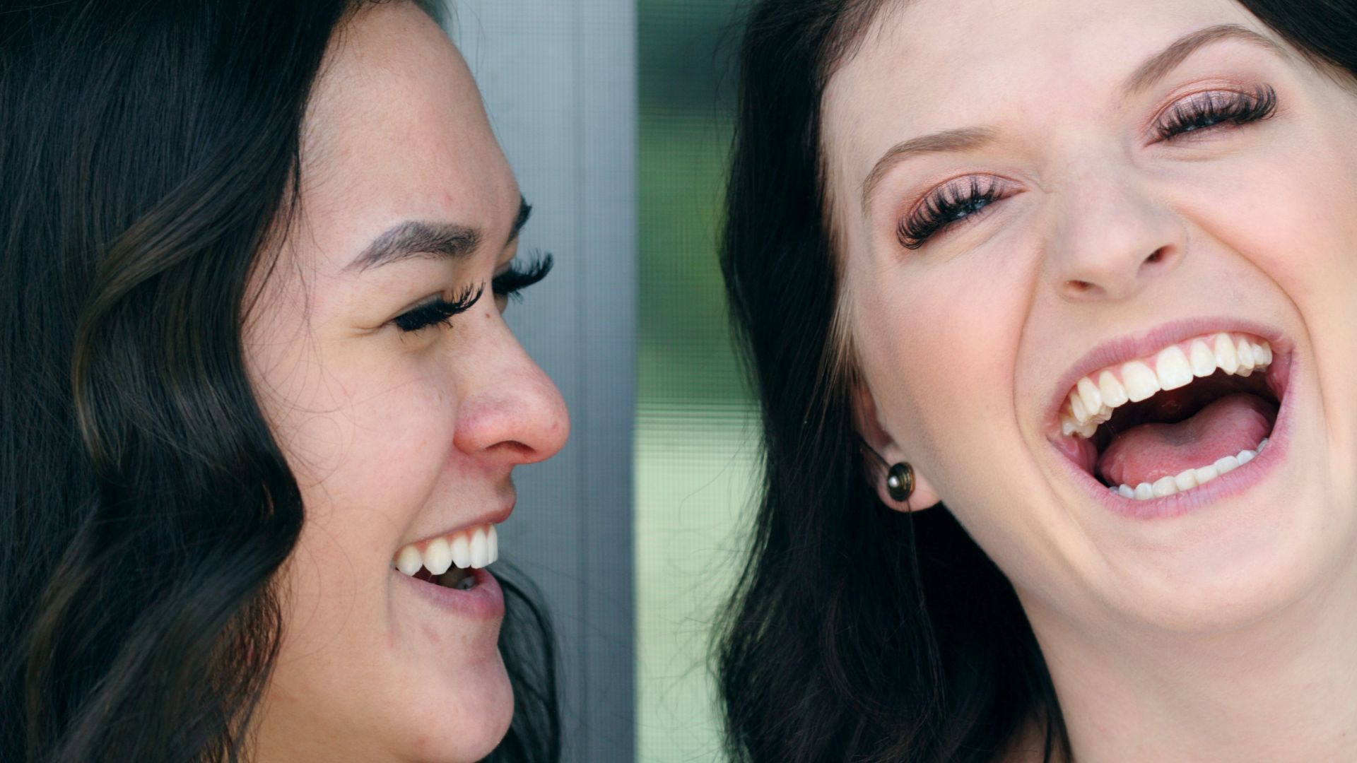 two woman laughing