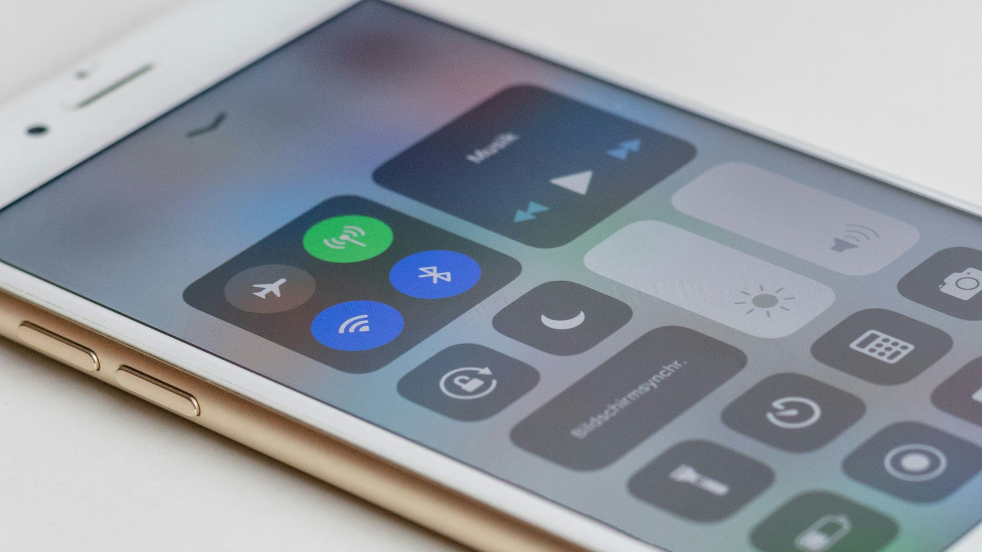 gold iPhone 6s is turned on