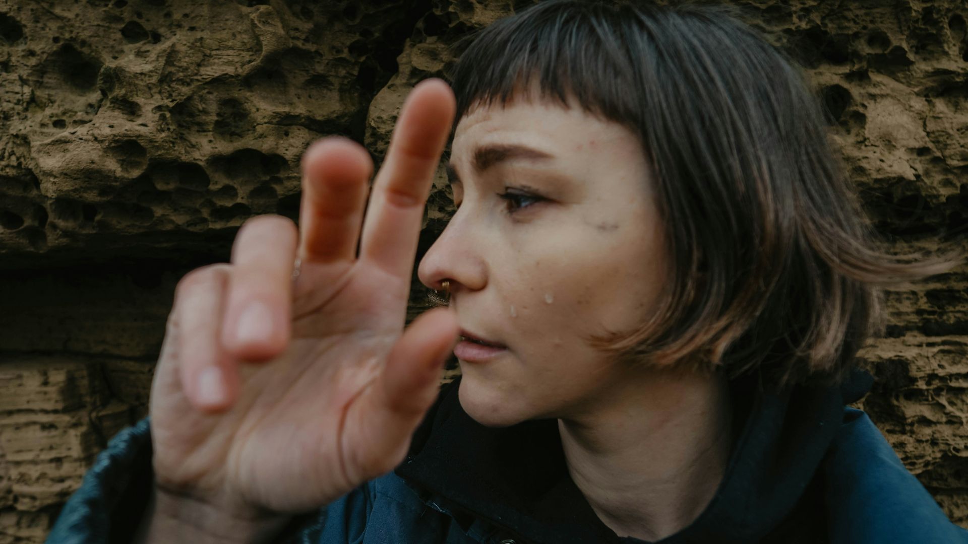 woman in blue zip up jacket