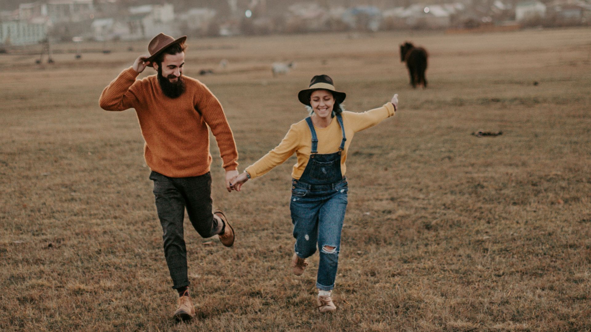 man holdind woman hand