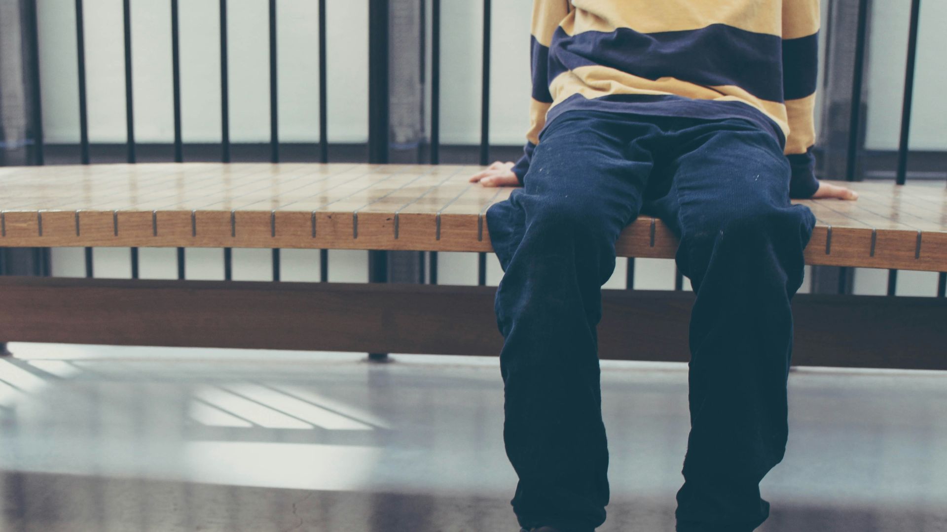 person sitting on bench