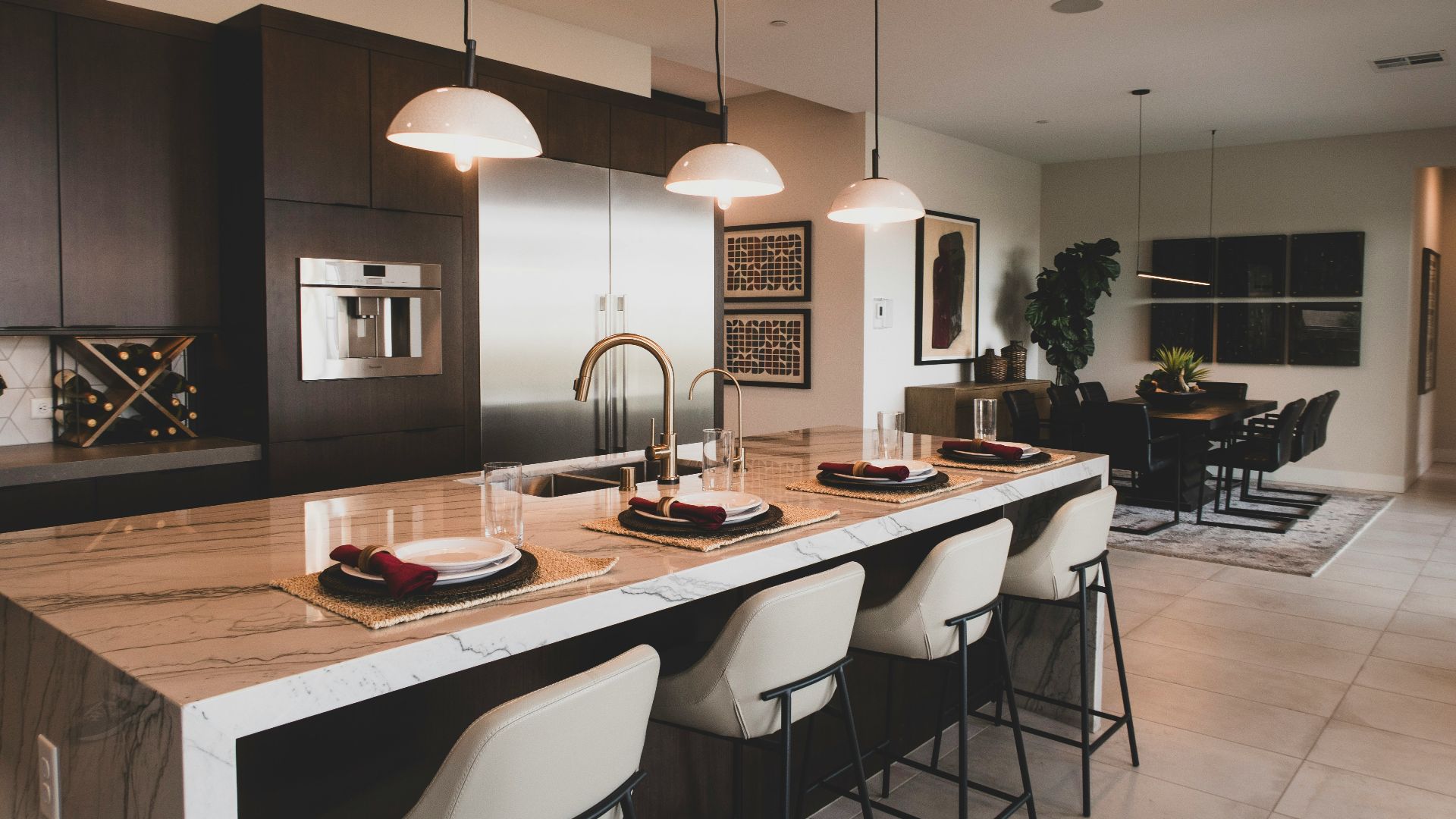 a kitchen with a marble counter top and a center island