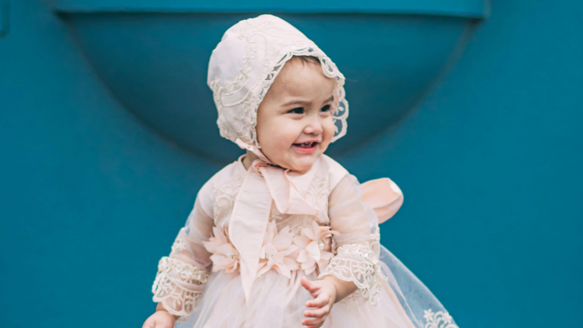 girl in white floral dress and white floral hijab