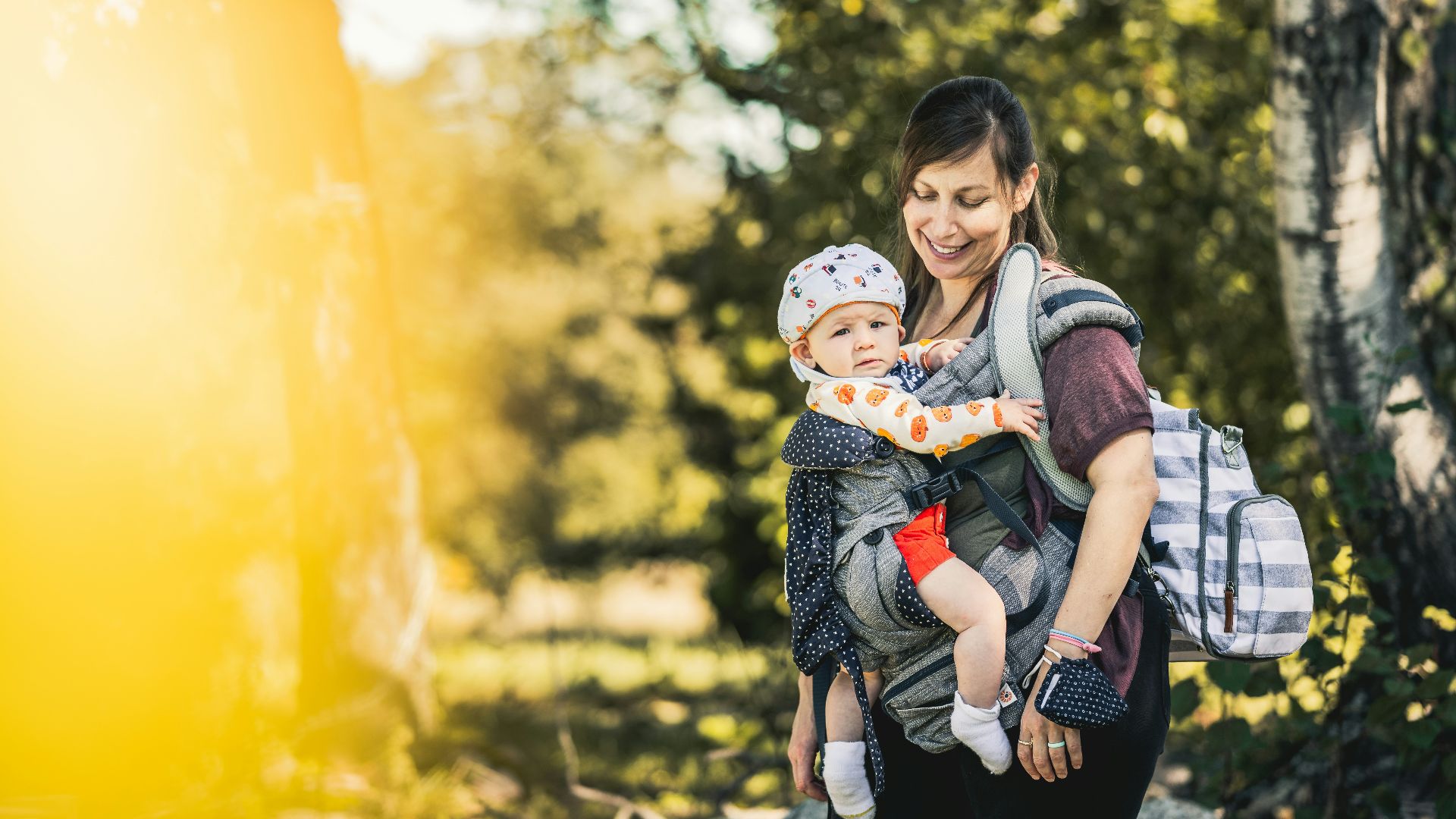 a woman holding a child in her arms