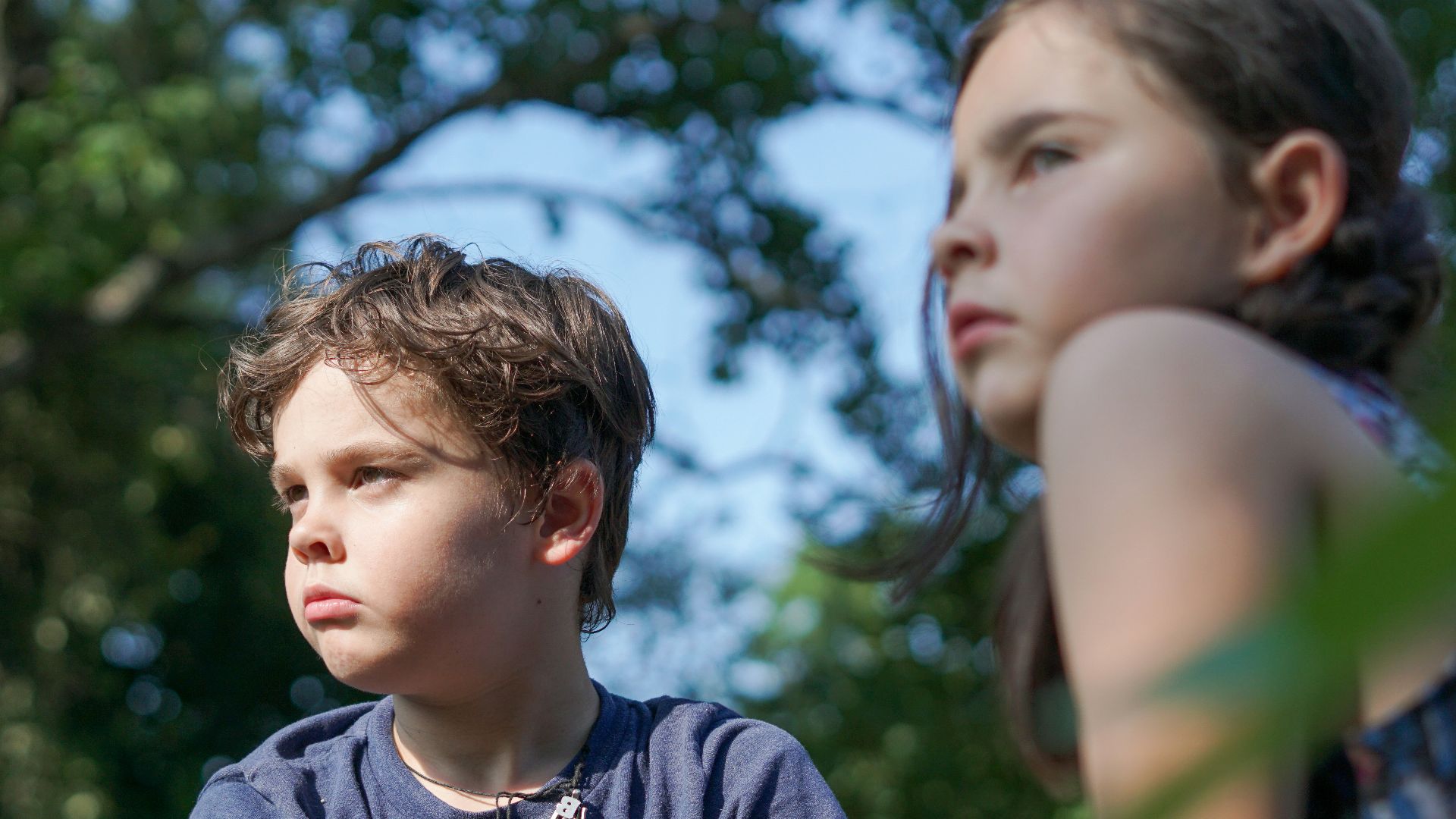 boy in blue crew neck t-shirt