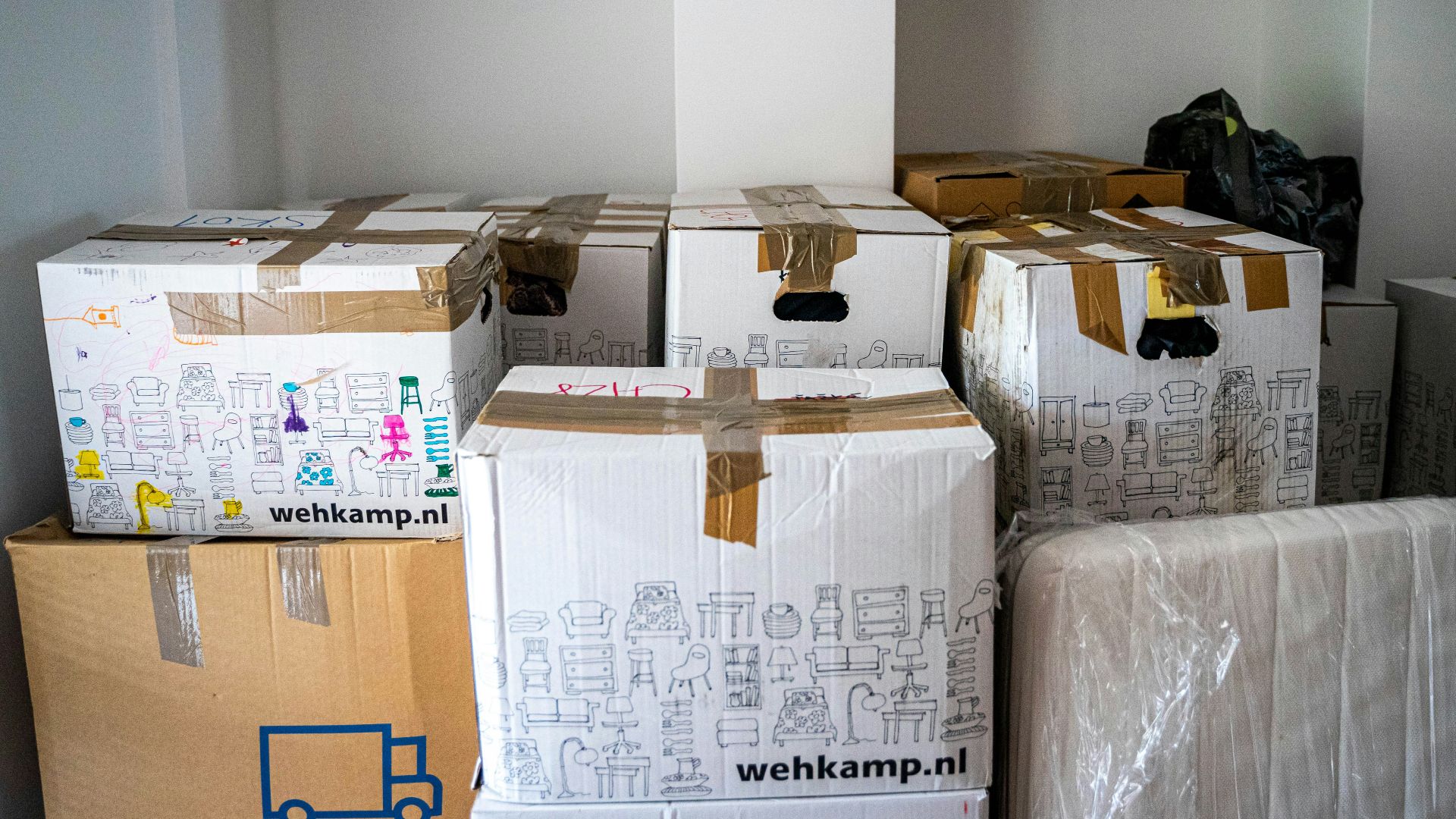 brown cardboard boxes on brown wooden table