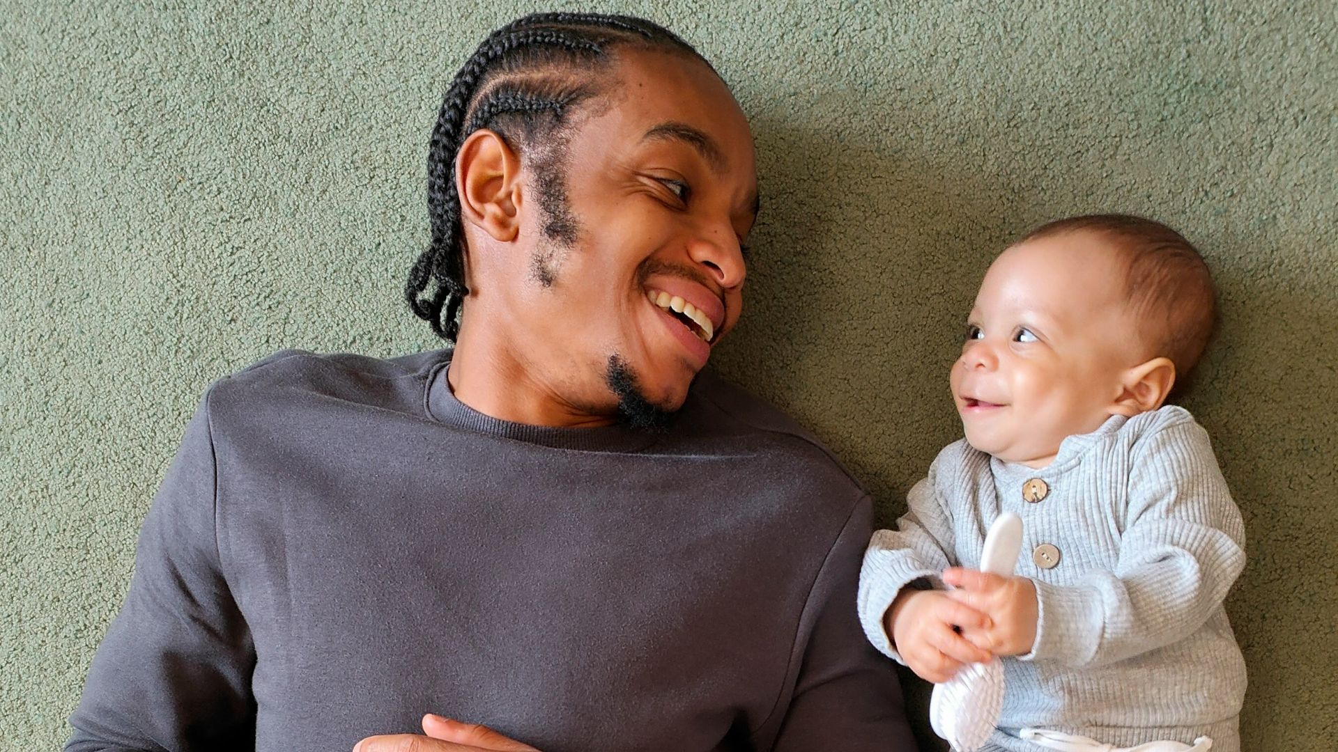 a person holding a baby