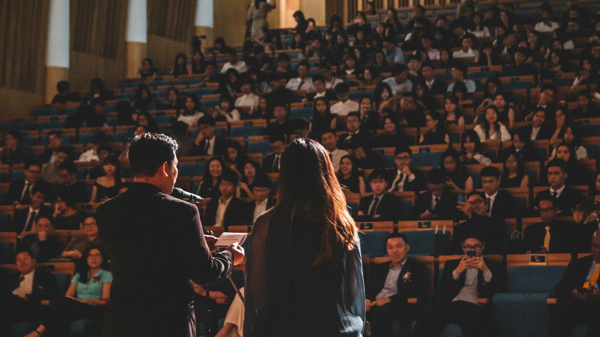 people sitting on chair inside room