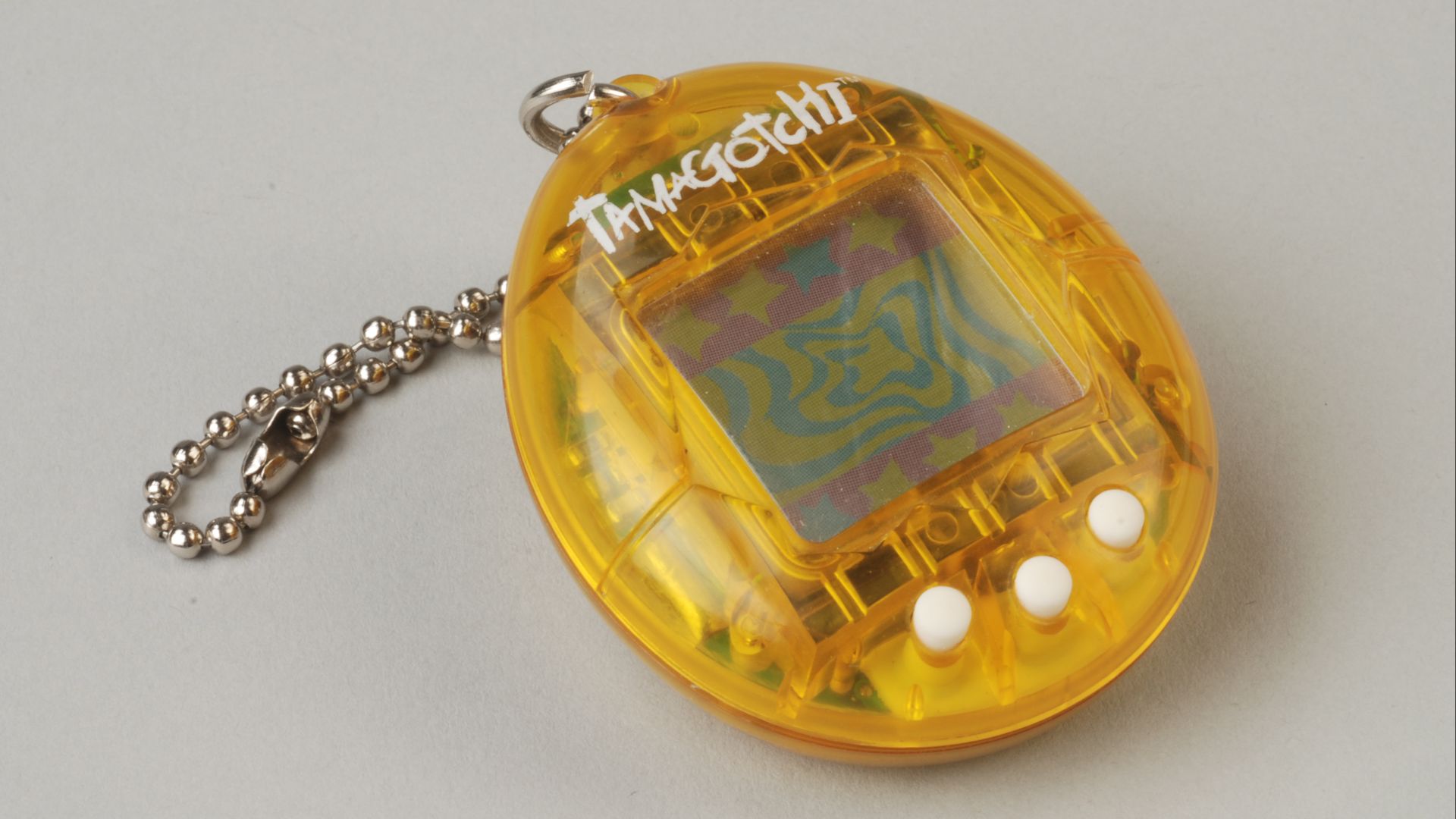 File:Gele tamagotchi, objectnr 78041.JPG