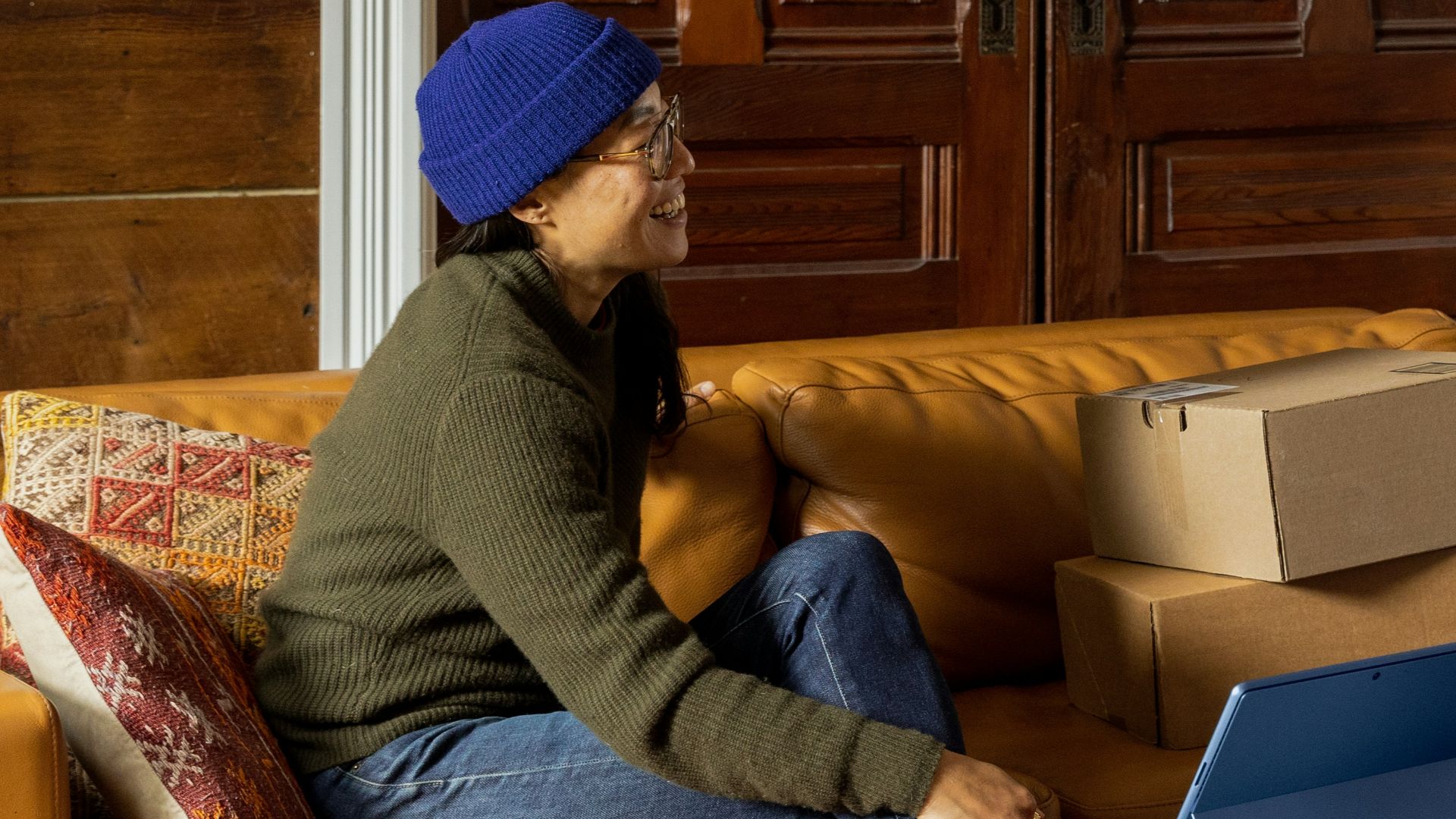 a group of people sitting around a living room