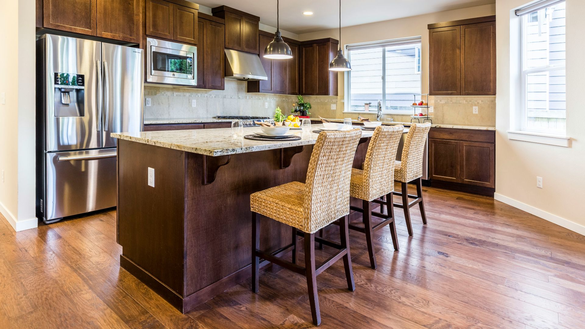 brown kitchen cabinet with kitchen island