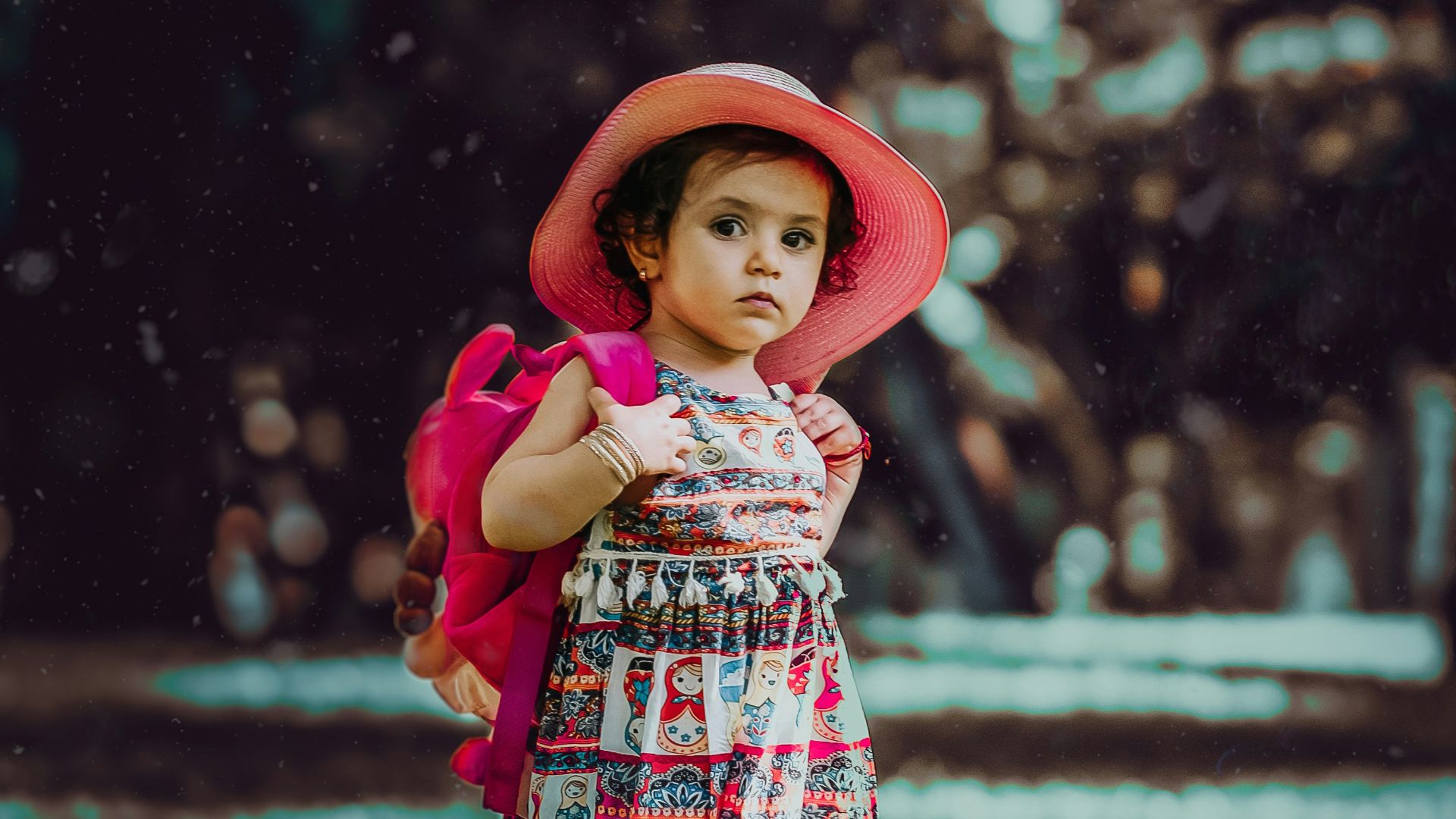 toddler carrying backpack