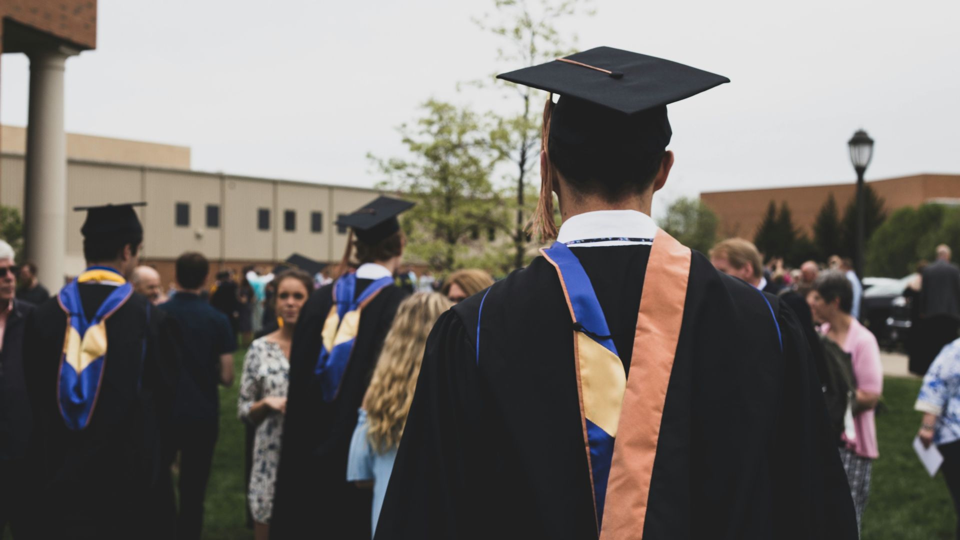 man wearing academic gown