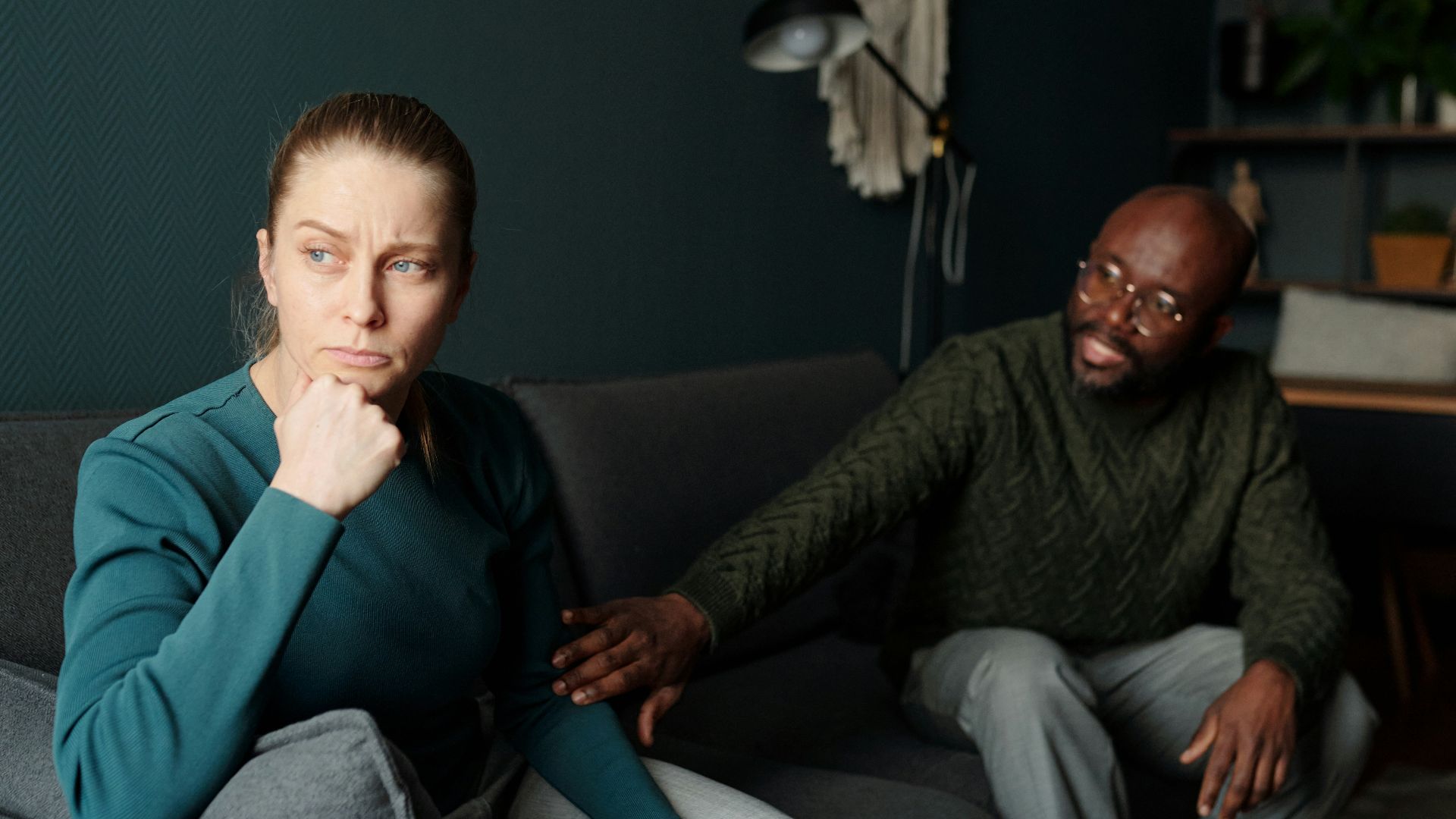 A couple appears to be having a serious conversation.