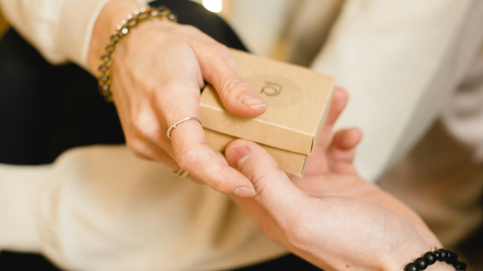 person holding gold iphone 6