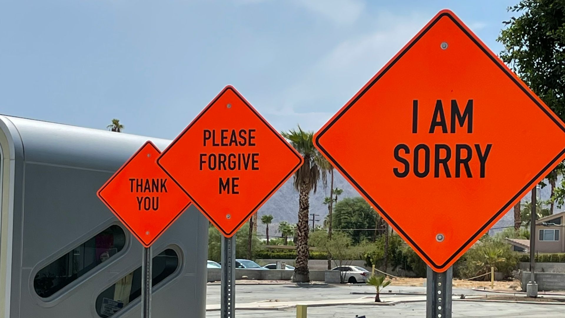 white and red street sign