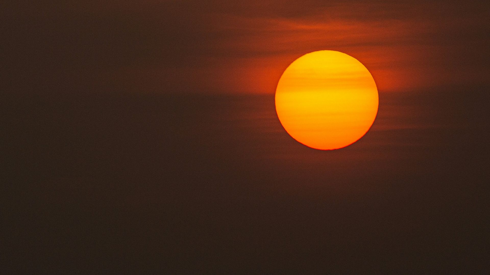 low-light photo of sun