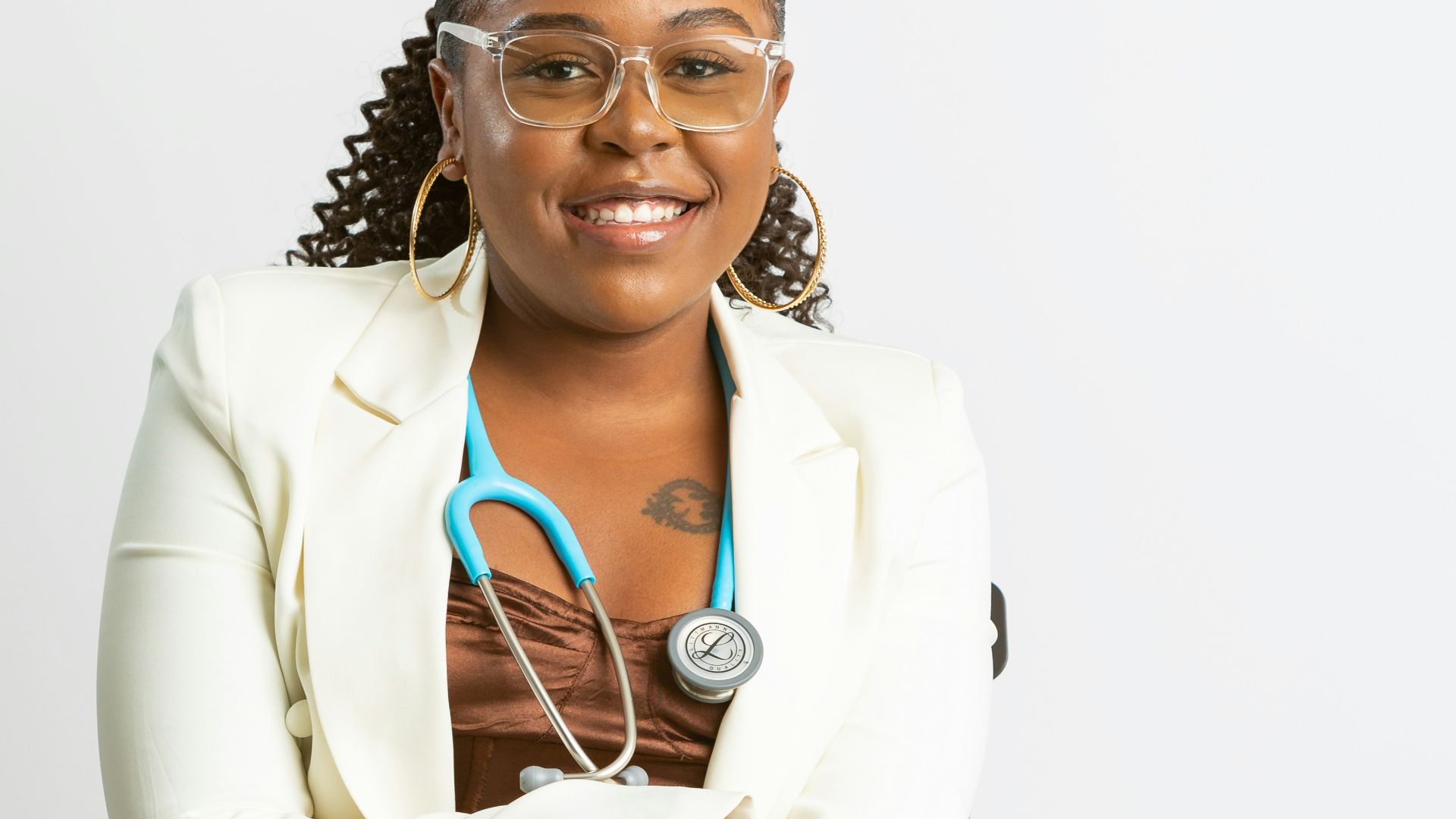 a woman in a white coat