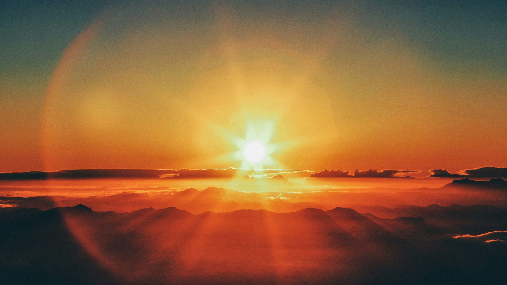 calm body of water during sunset