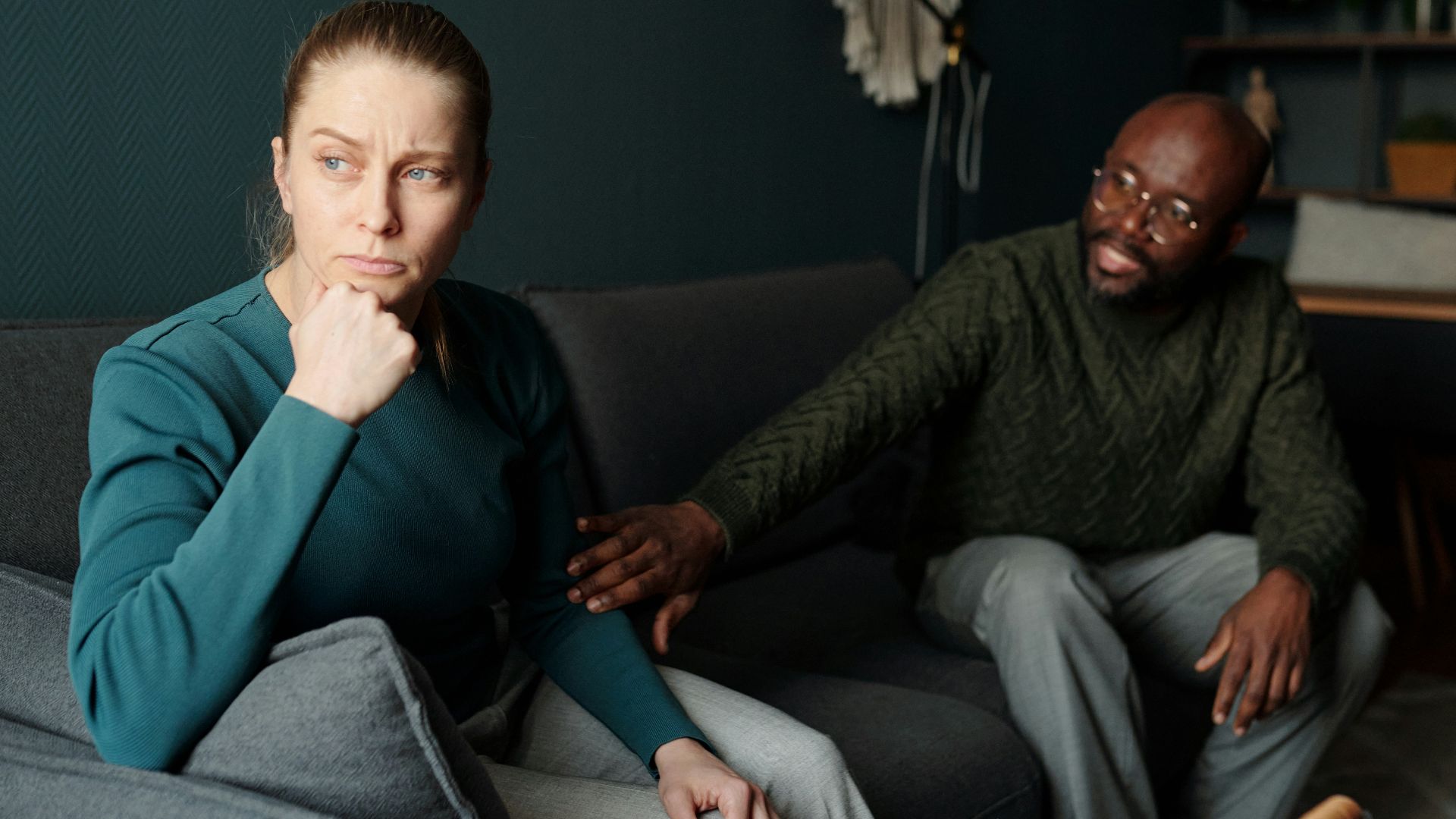 A couple appears to be having a serious conversation.