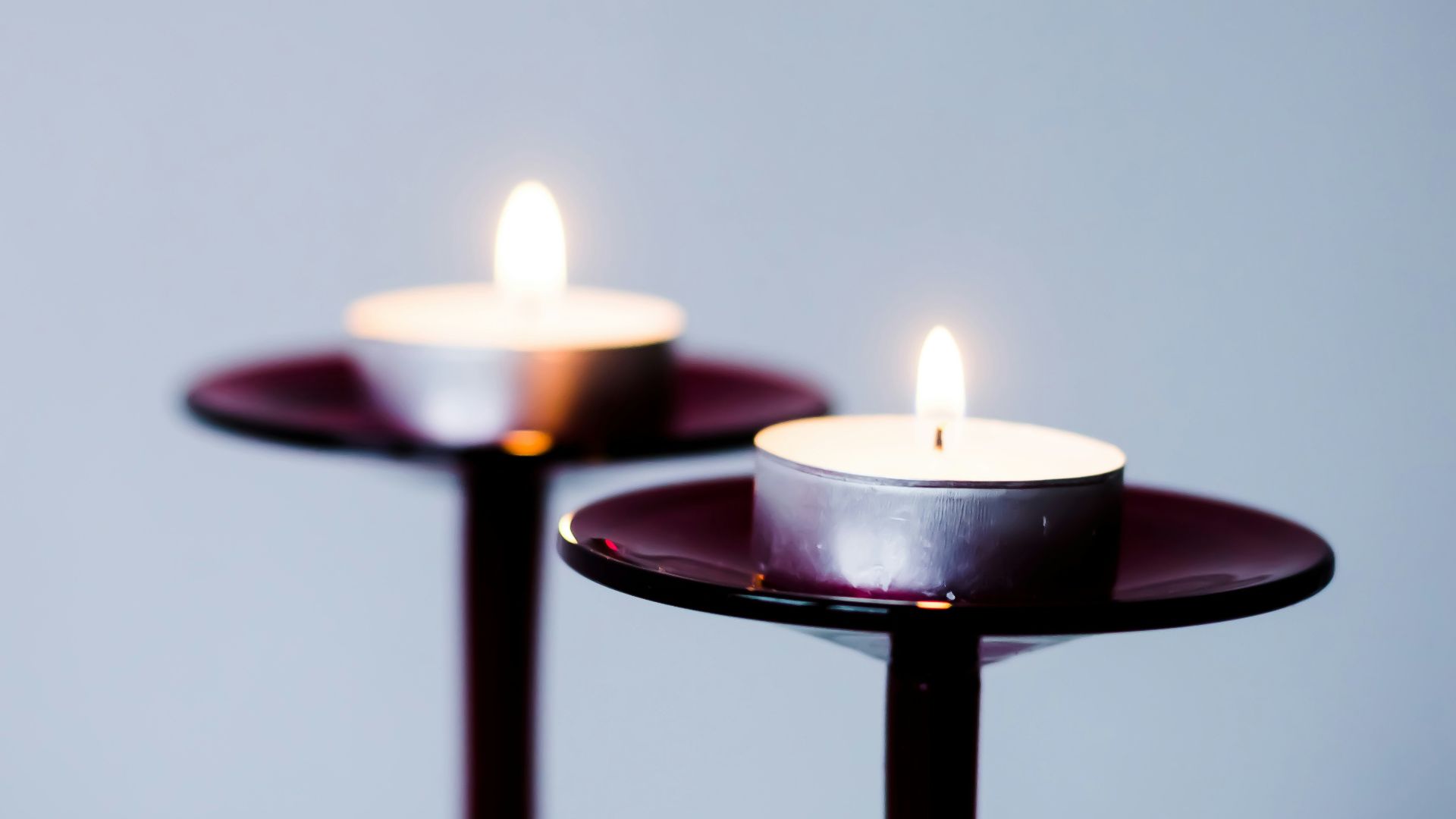 two lit tealight candles