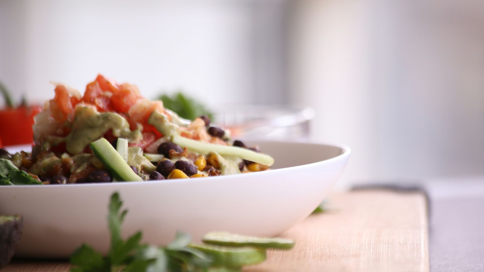 food in white bowl on brown wooden board