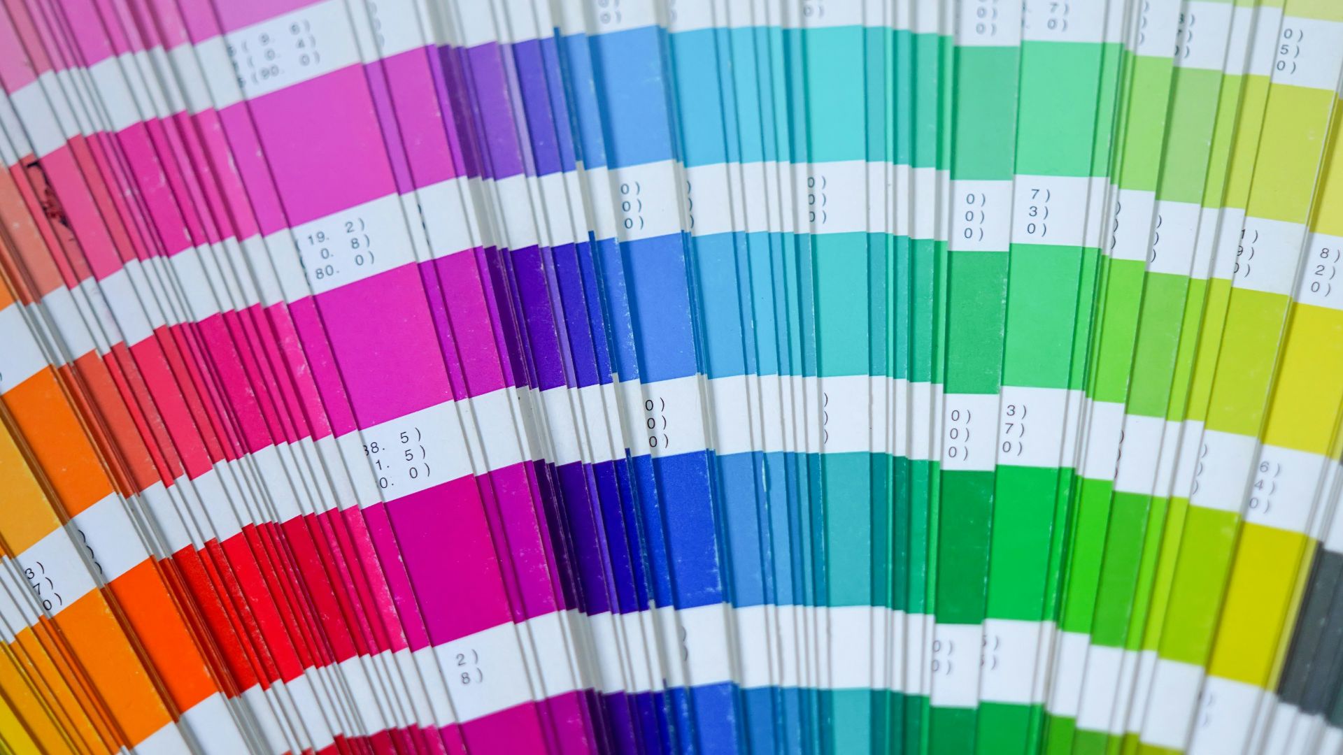 a close up of a pantone book with color swatches
