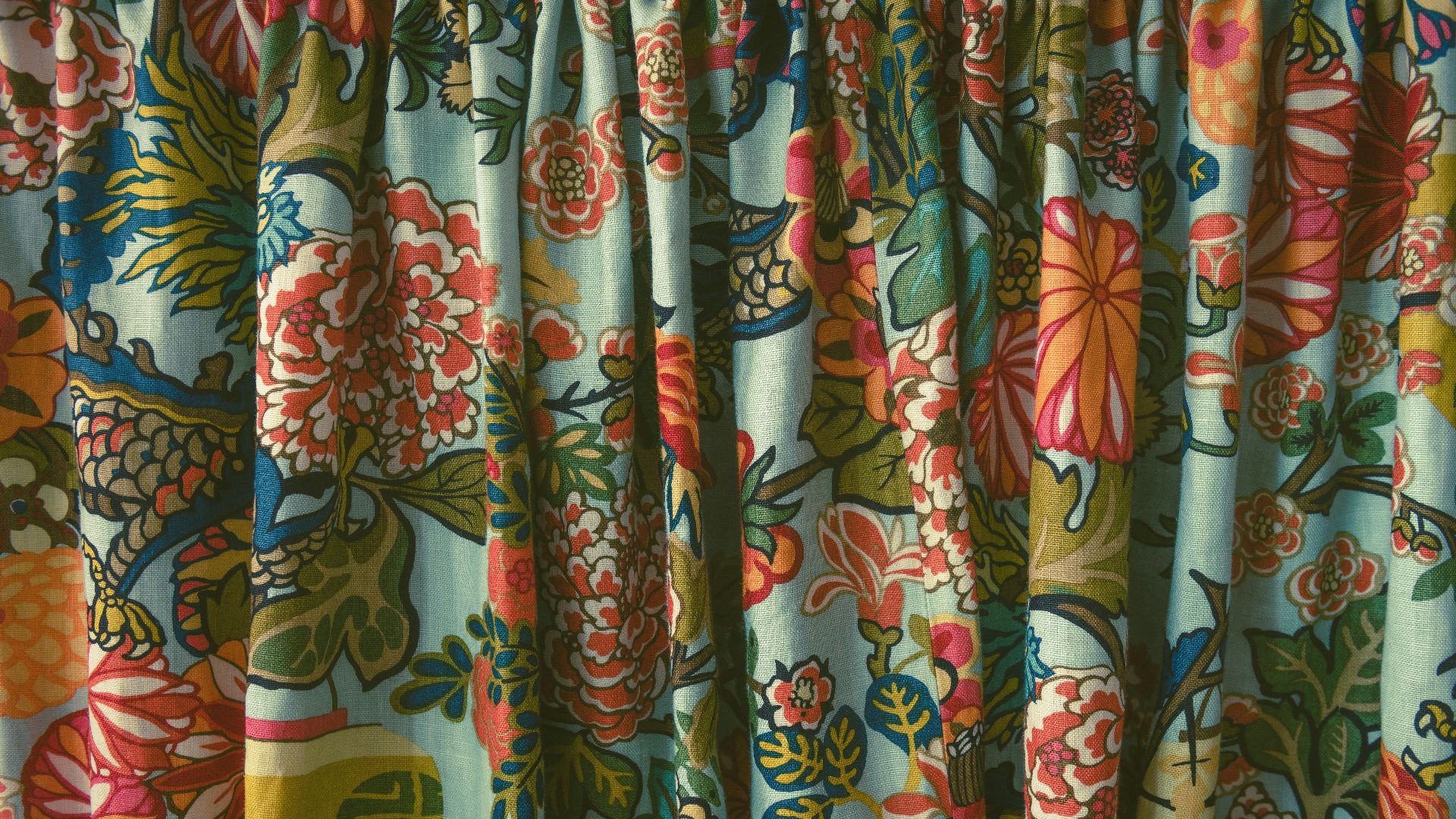 red yellow and blue floral textile