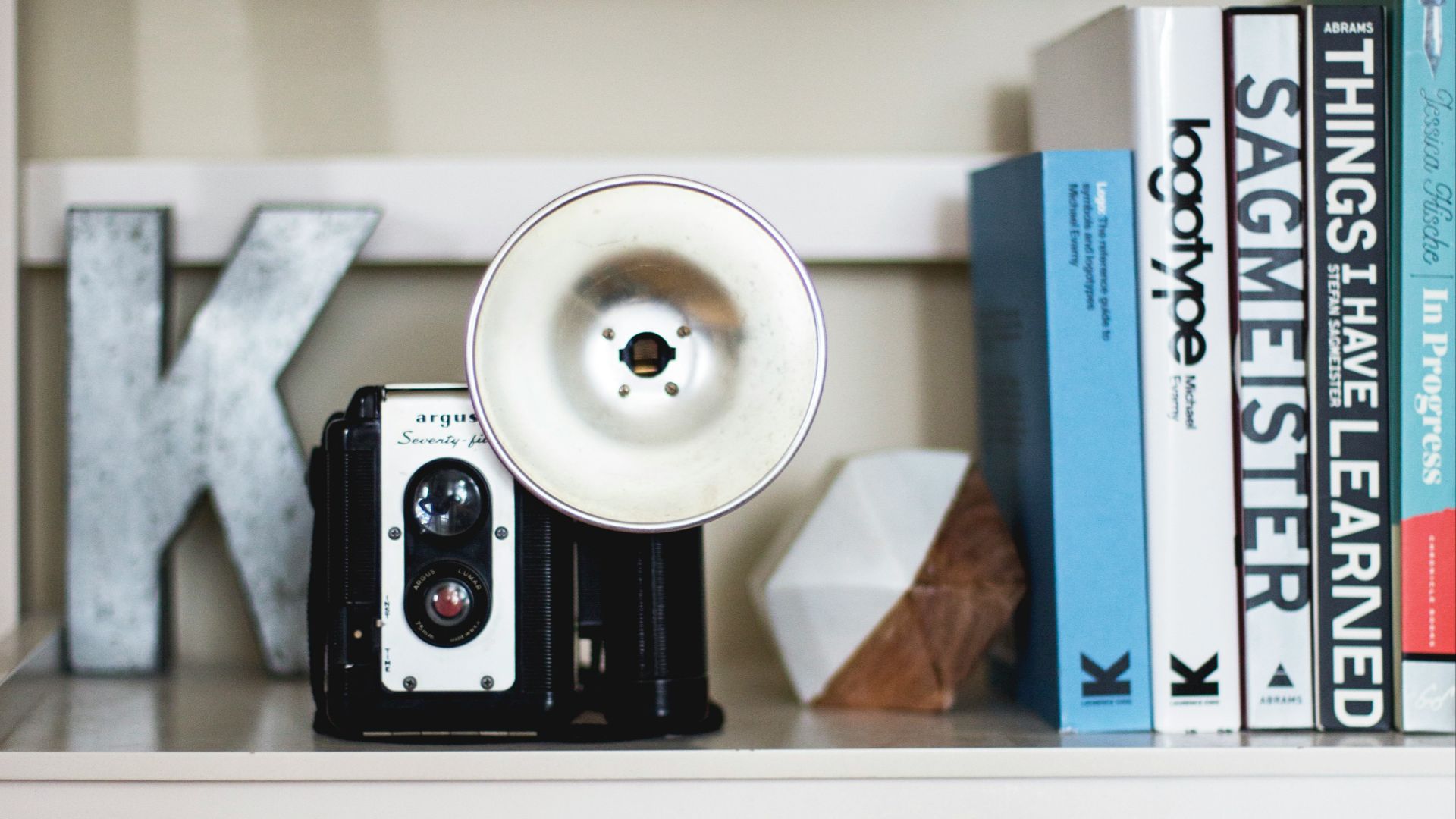 black camera on shelf