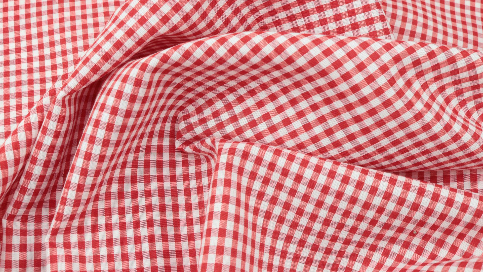 red and white checkered textile