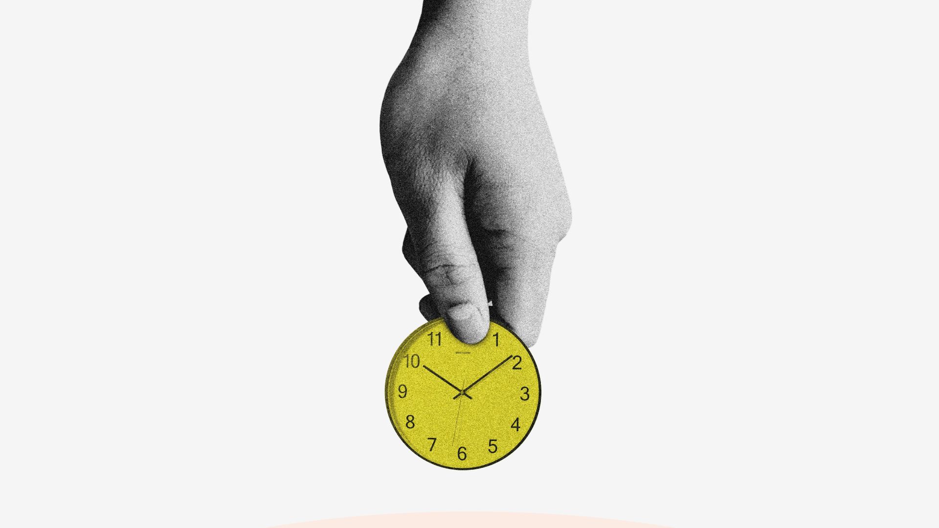 person holding yellow round analog clock