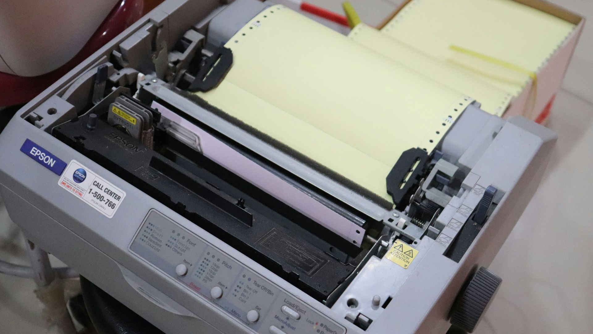 white and gray printer on white table