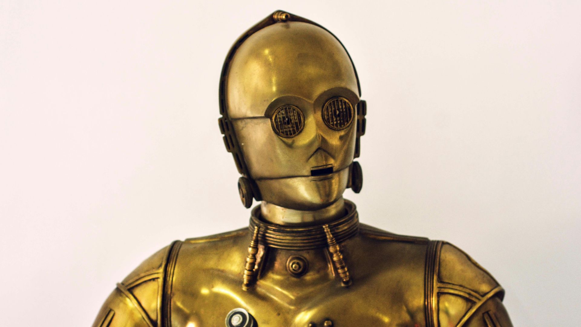 person wearing gold mask and mask