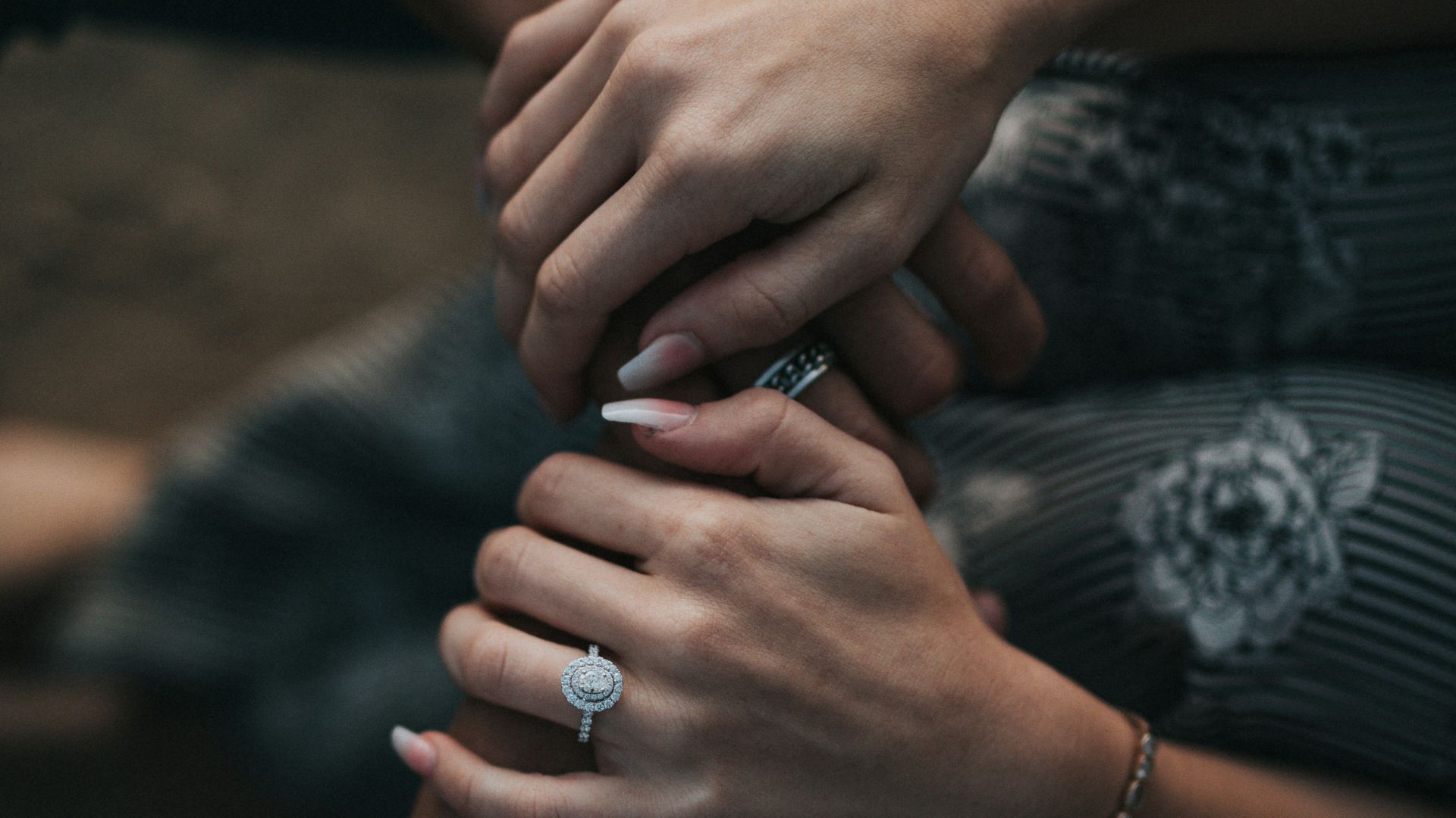 man and woman holding each others hands