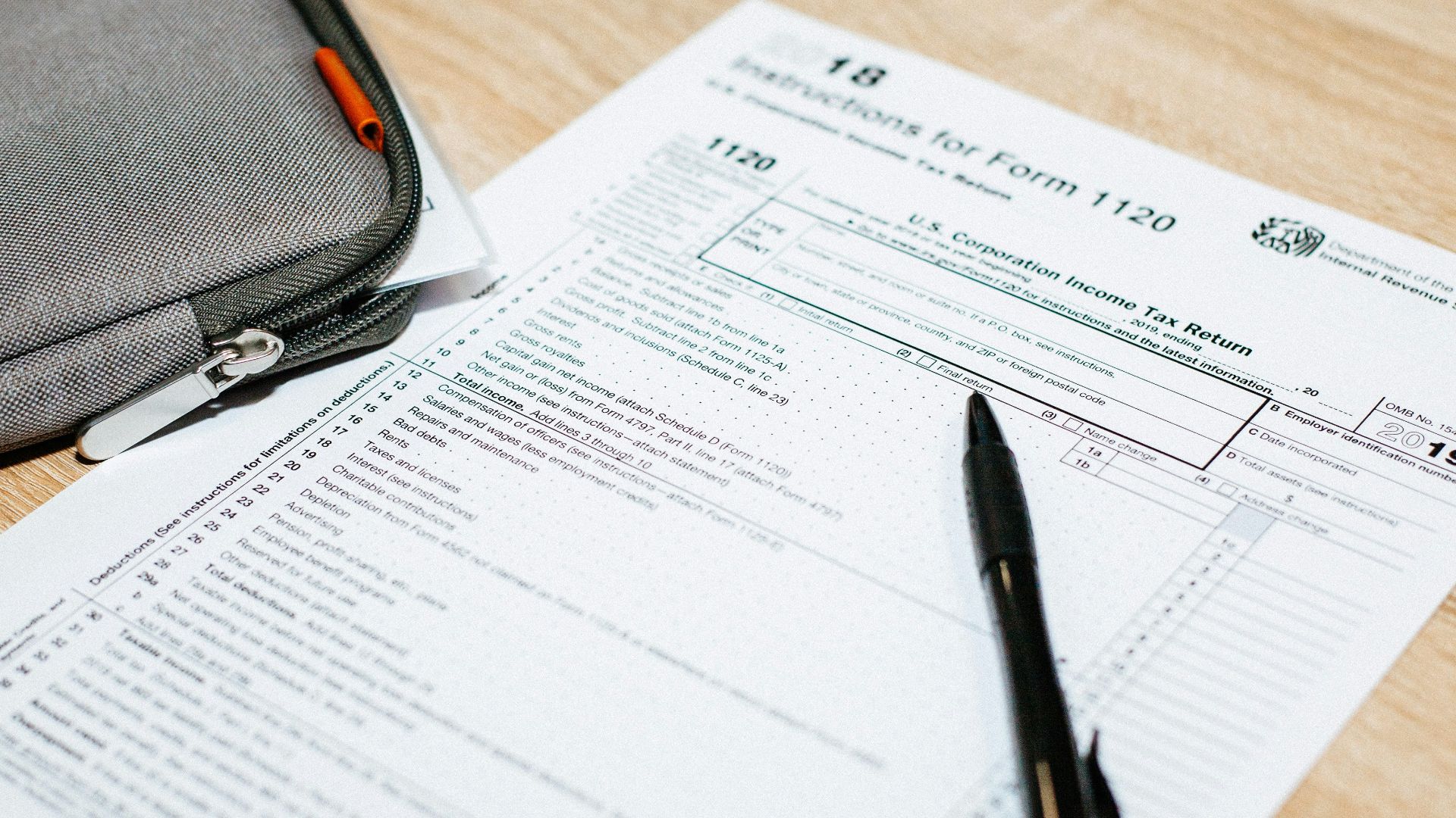 black click pen on white paper