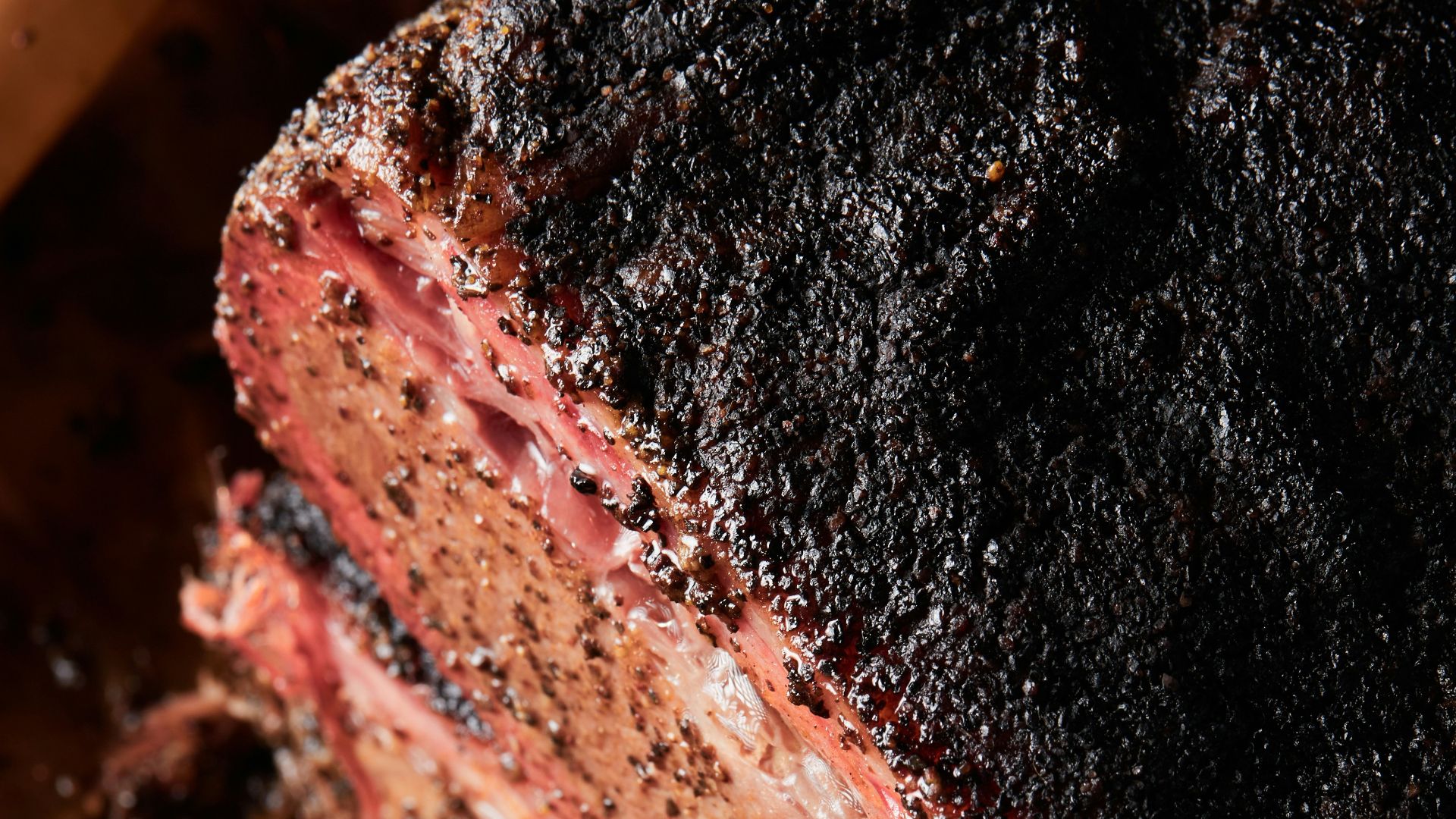 black textile on brown wooden table