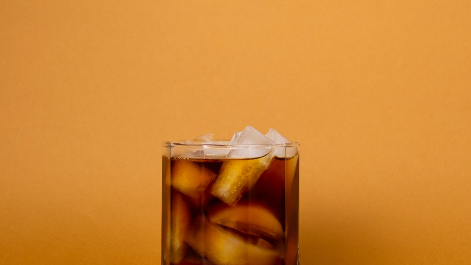 glass cup of beverage